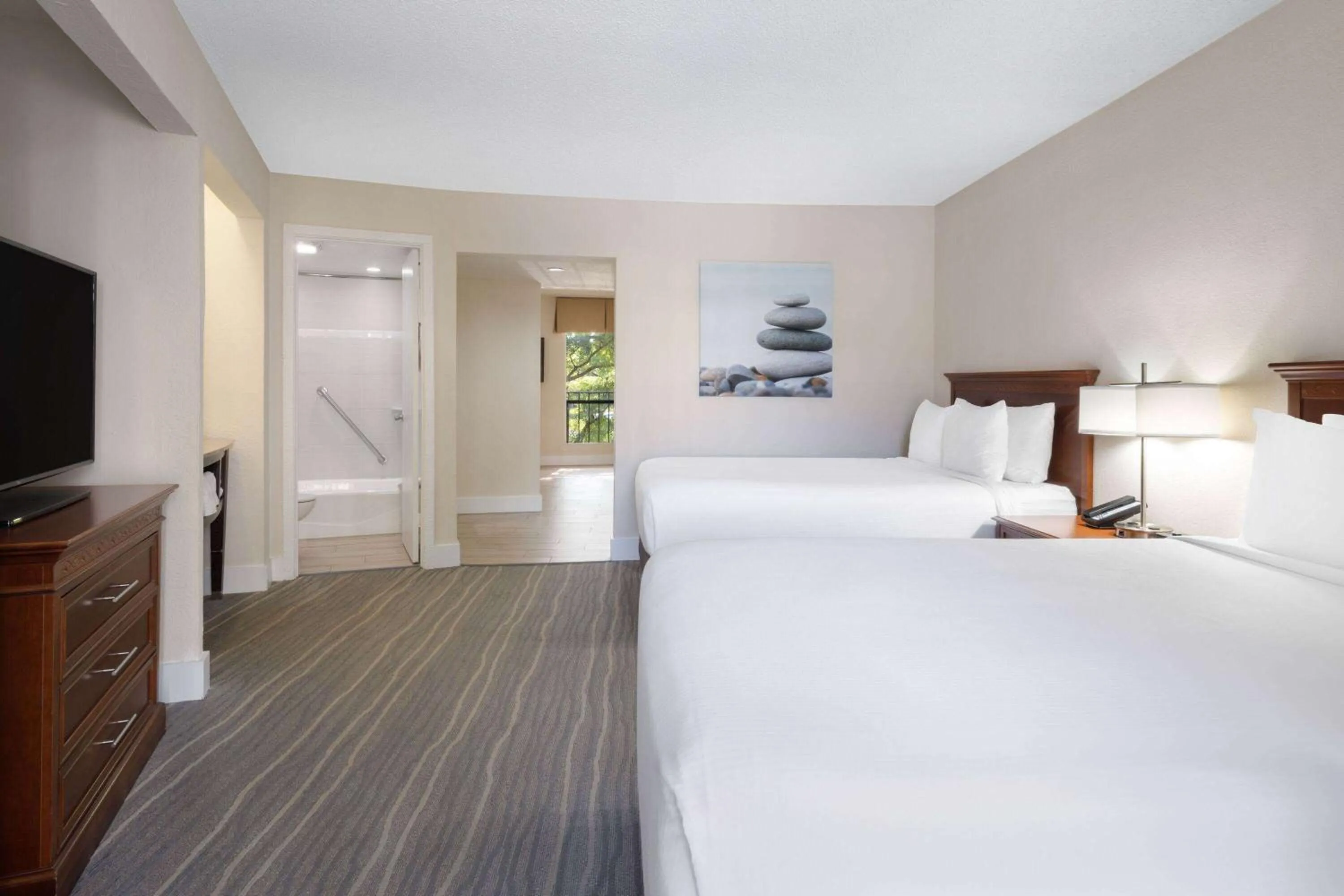 Bed in Wyndham Boca Raton Hotel