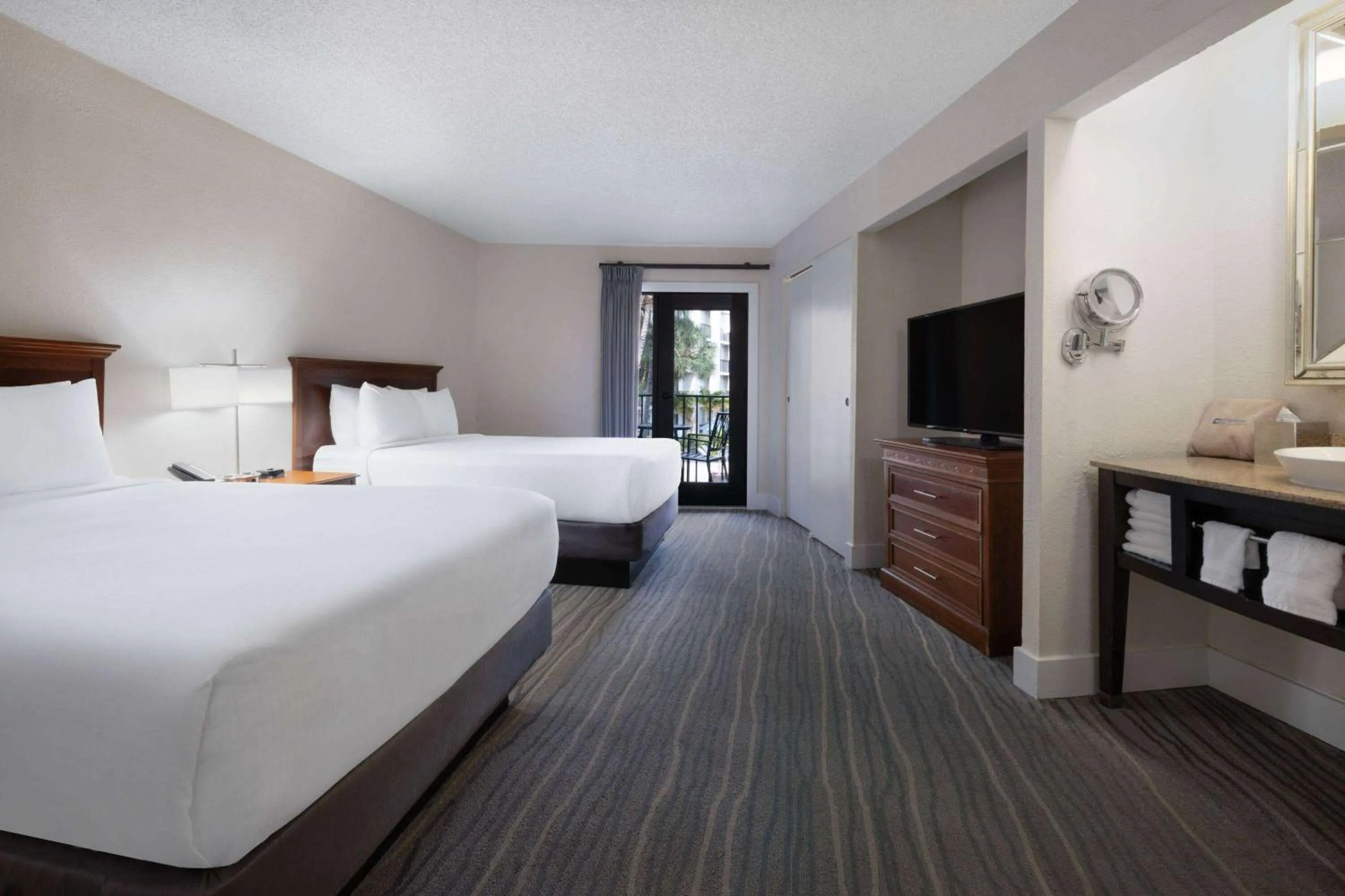 Bed in Wyndham Boca Raton Hotel