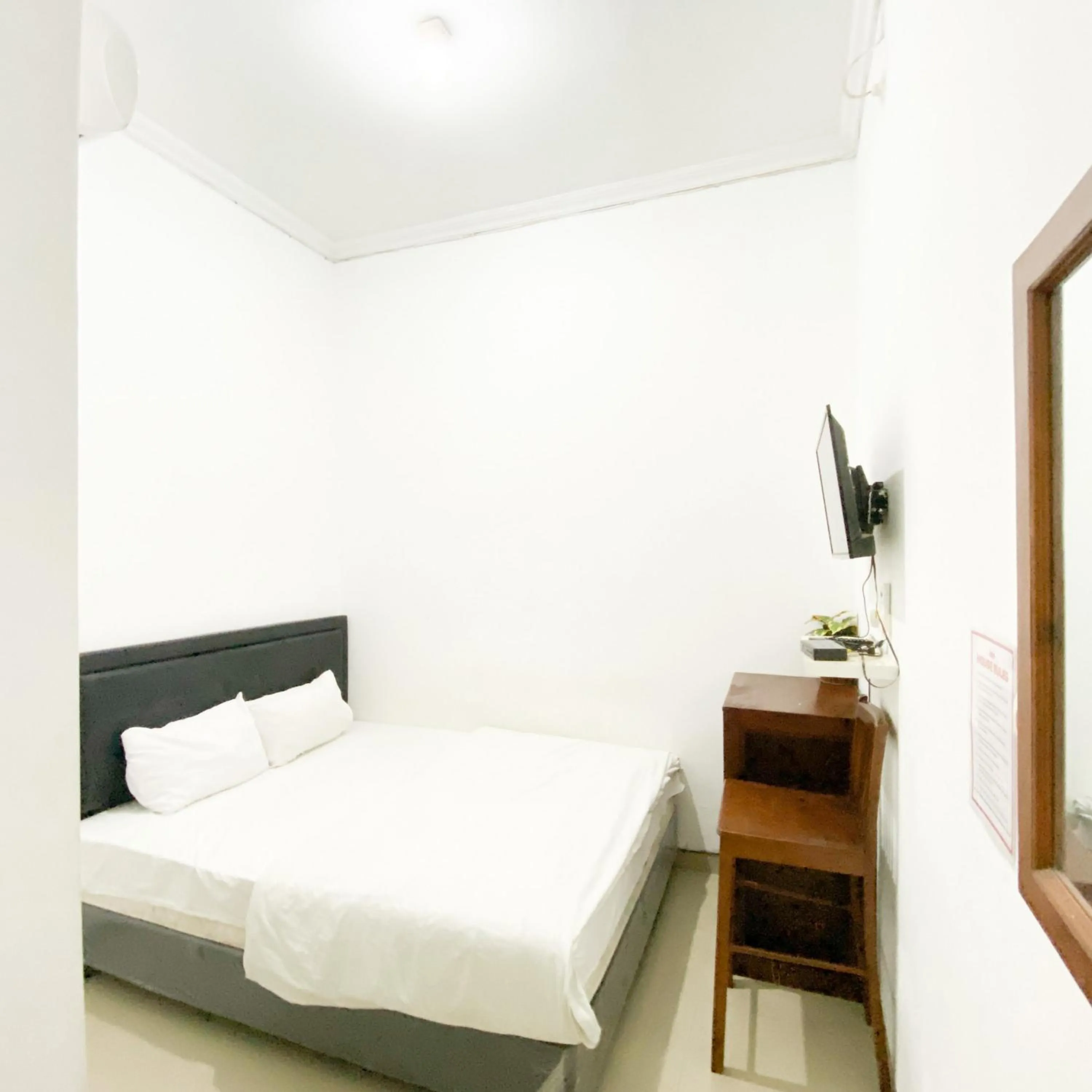 Bedroom in The Eco Village Homestay RedPartner