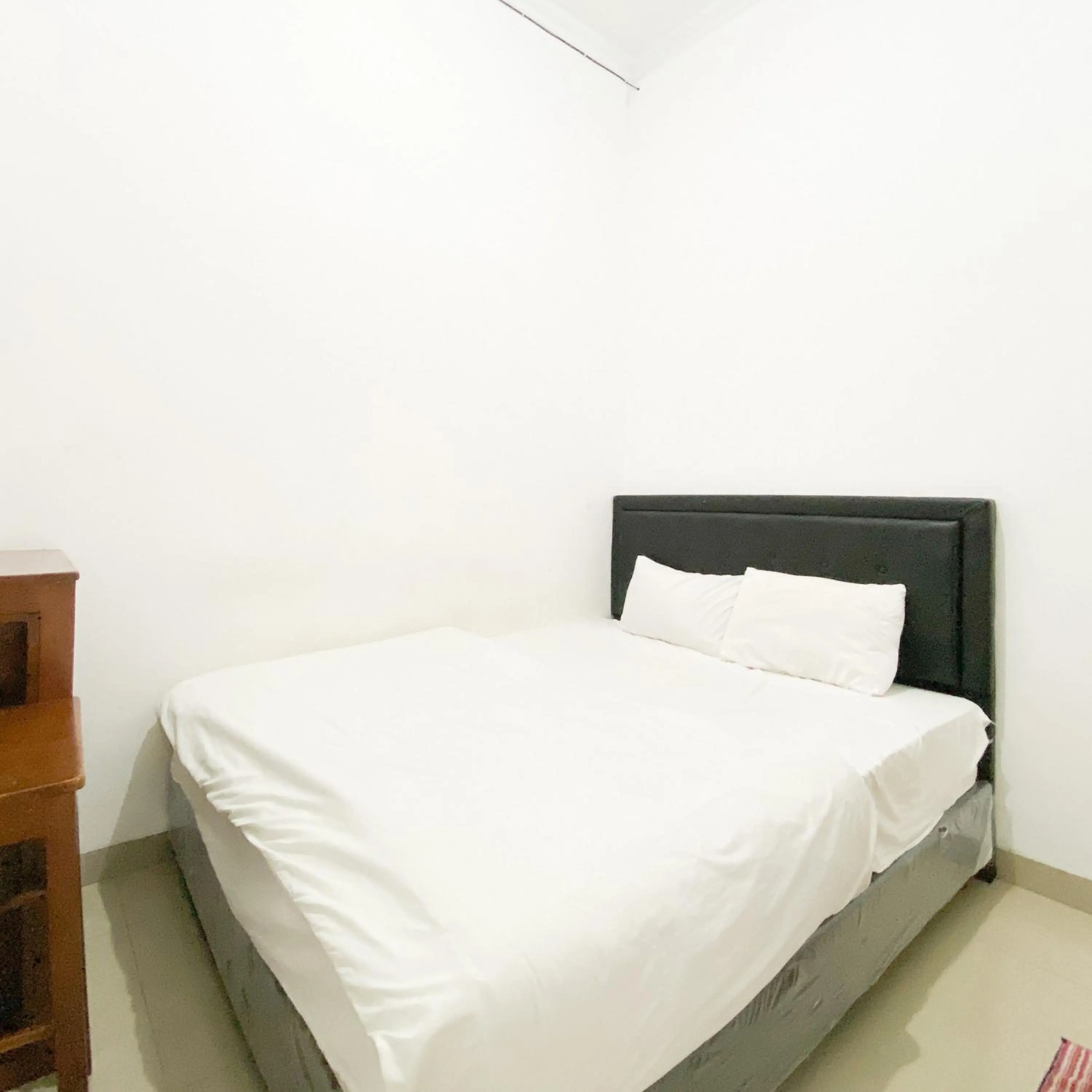 Bedroom in The Eco Village Homestay RedPartner