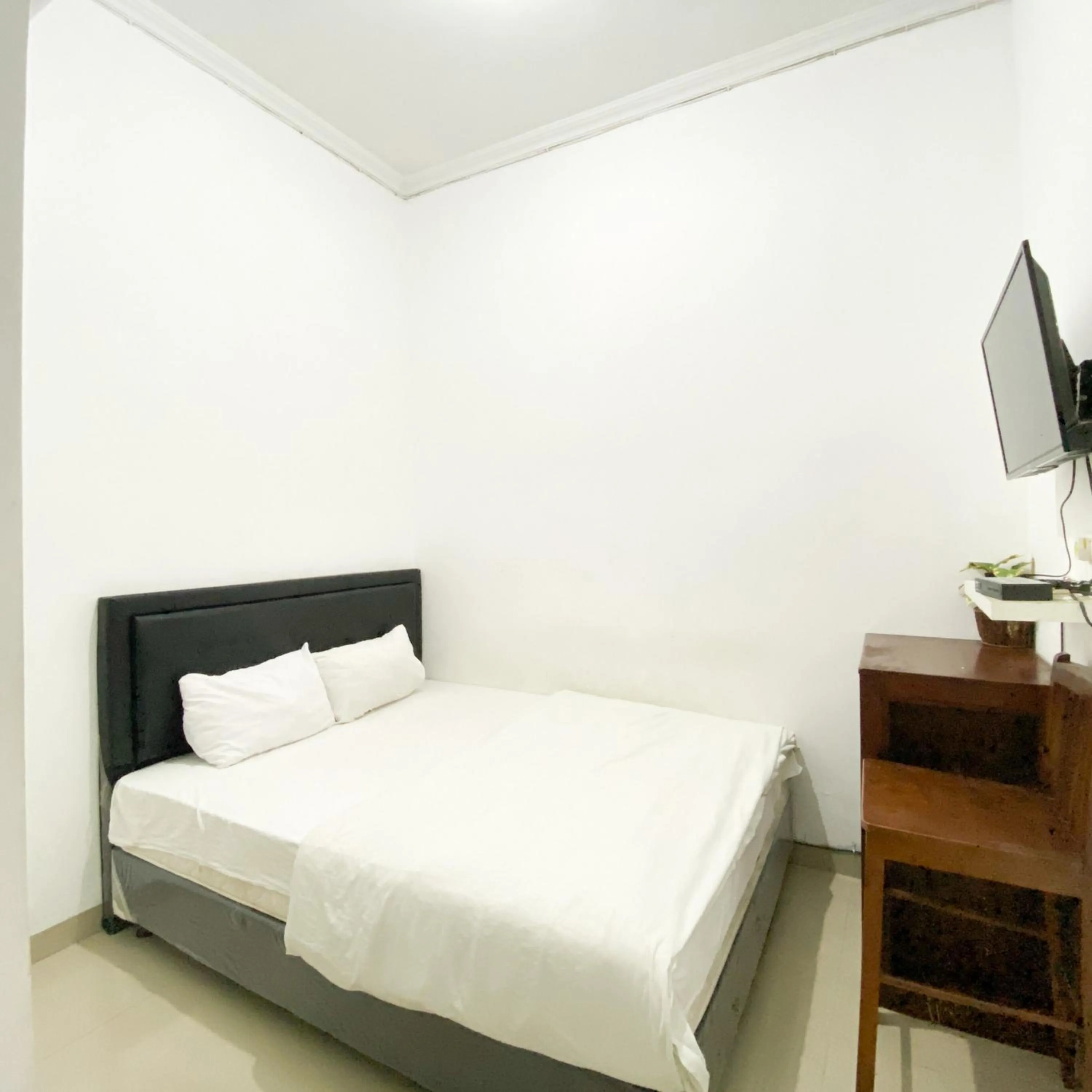 Bedroom in The Eco Village Homestay RedPartner