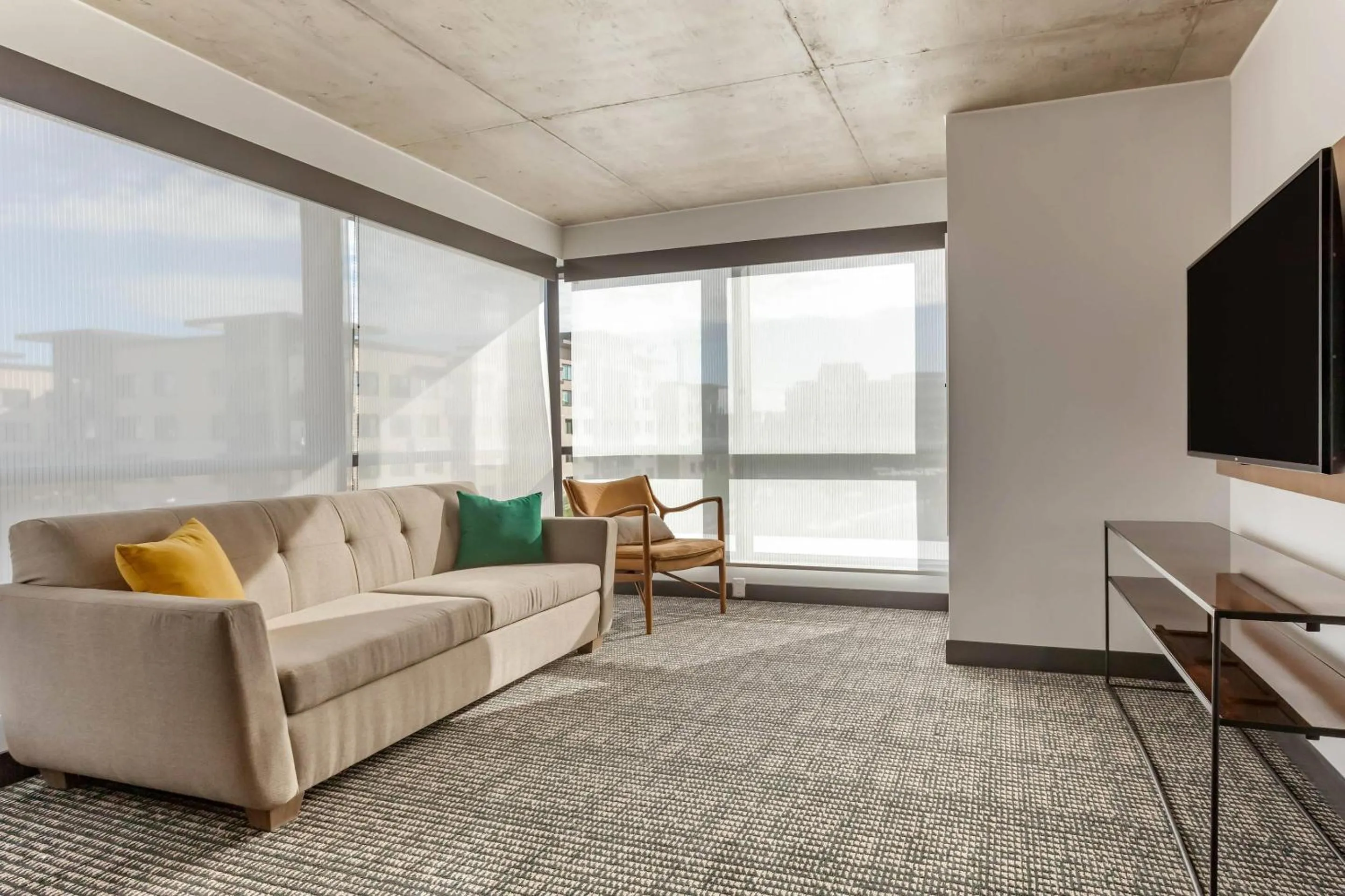 Living room in Cambria Downtown Phoenix Convention & Airport Hotel