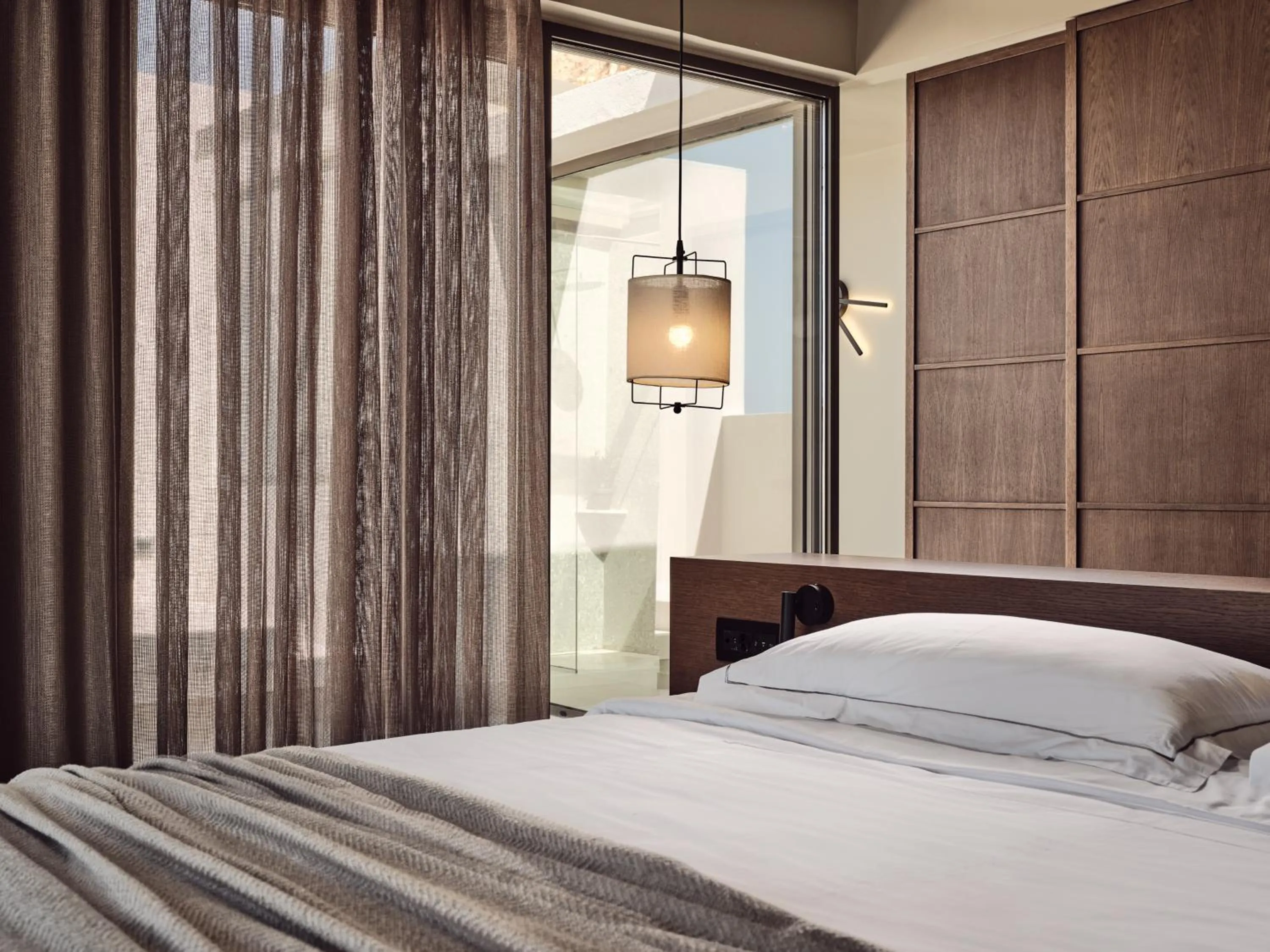 Bed in The Royal Senses Resort & Spa Crete, Curio Collection by Hilton