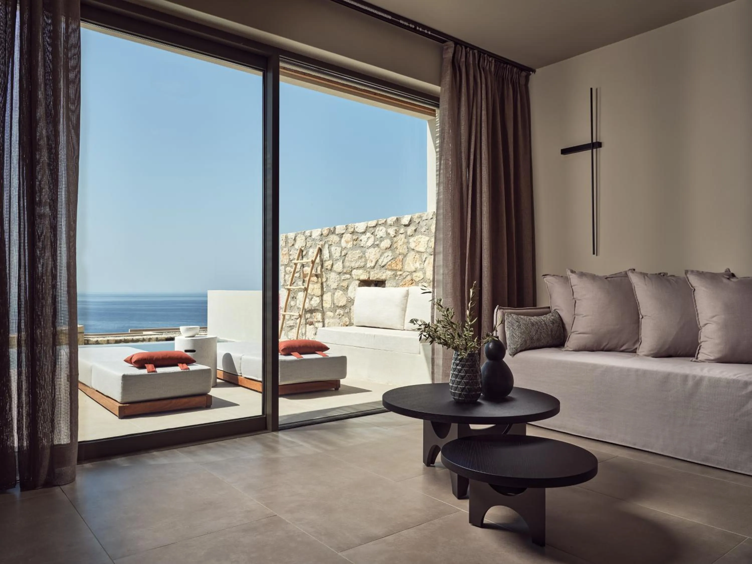 Living room in The Royal Senses Resort & Spa Crete, Curio Collection by Hilton
