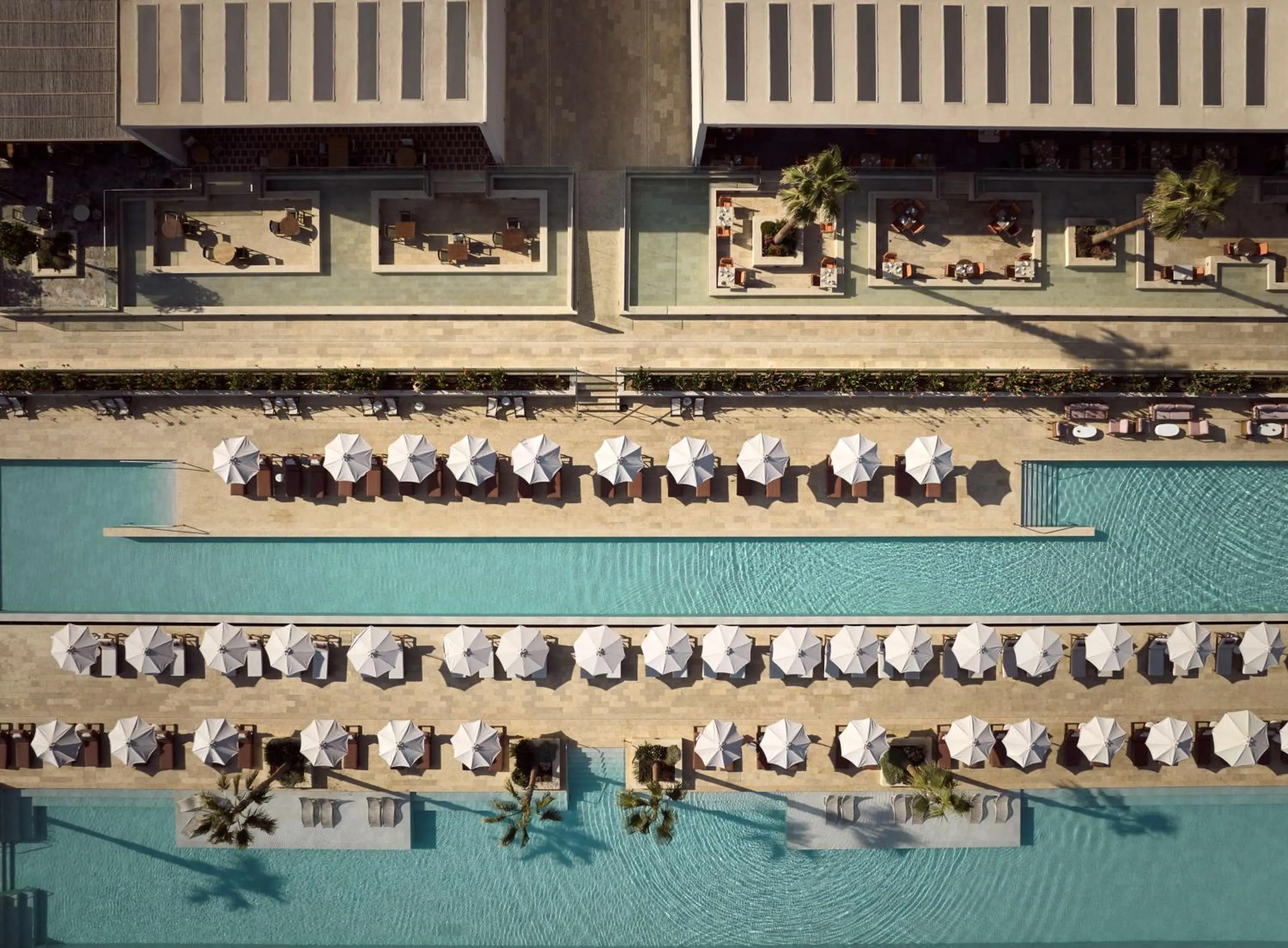 Pool view in The Royal Senses Resort & Spa Crete, Curio Collection by Hilton