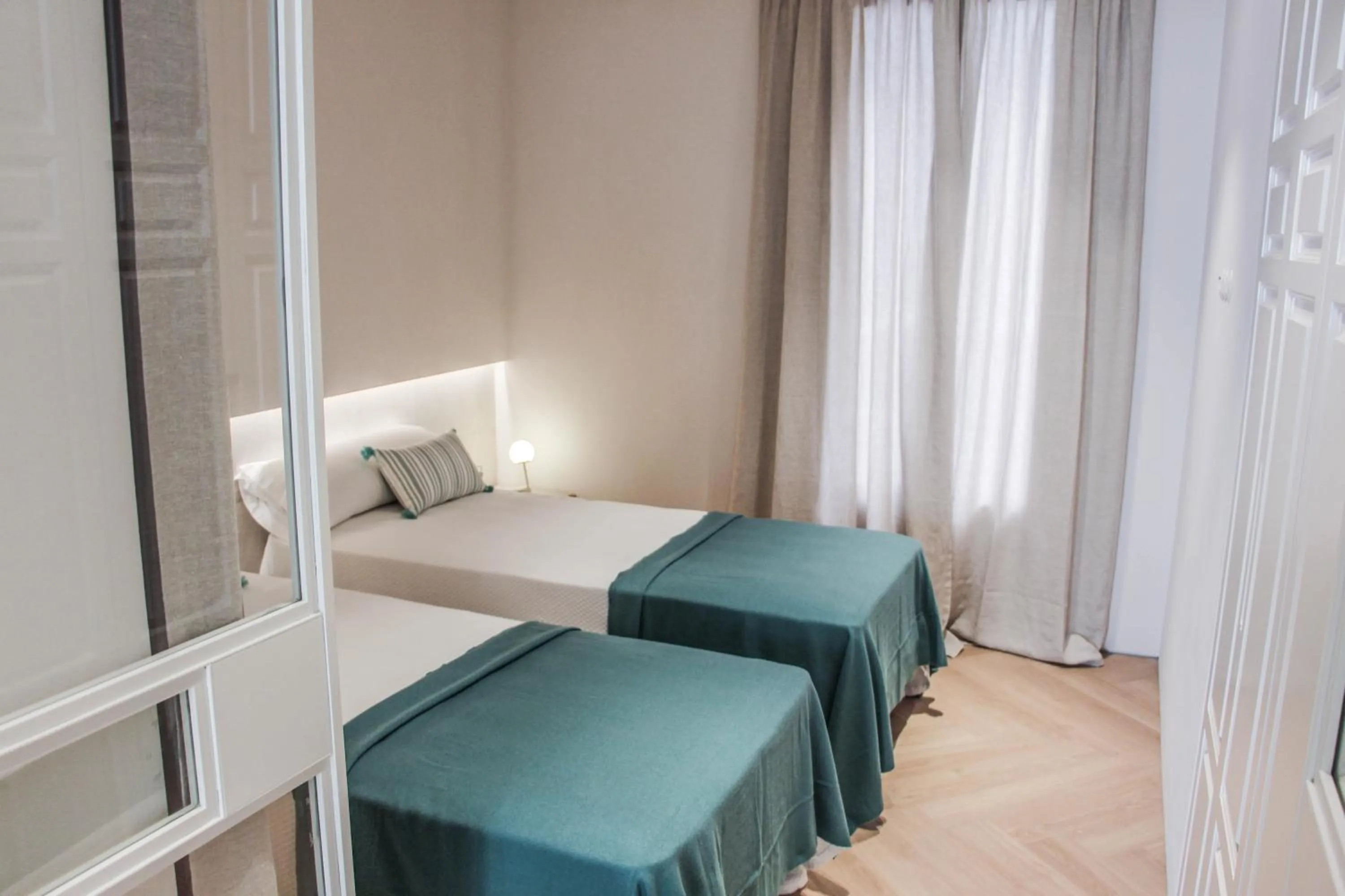 Photo of the whole room, Bed in The Boc Suites