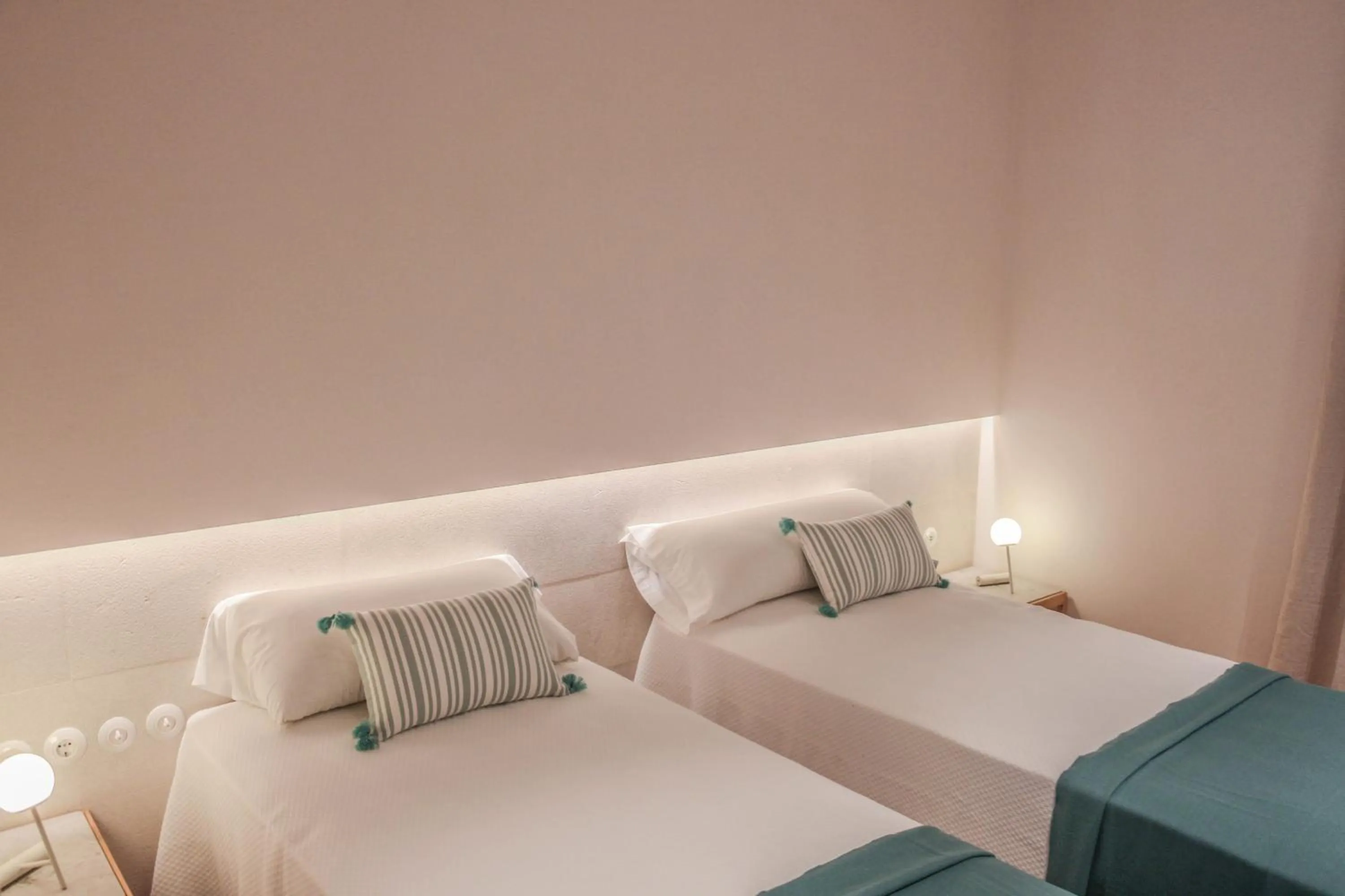 Bed in The Boc Suites