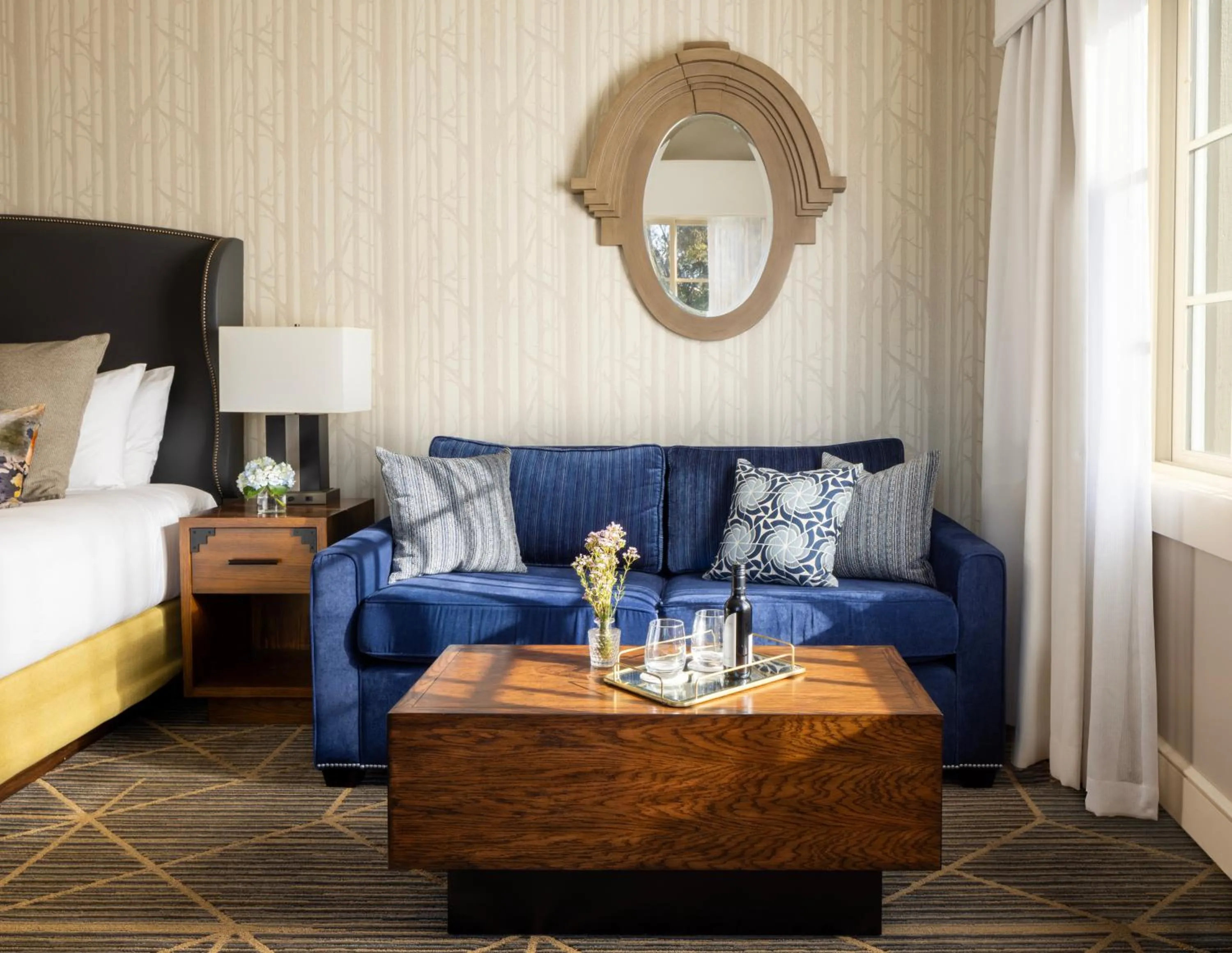 Seating area, Bed in River Terrace Inn, a Noble House Hotel
