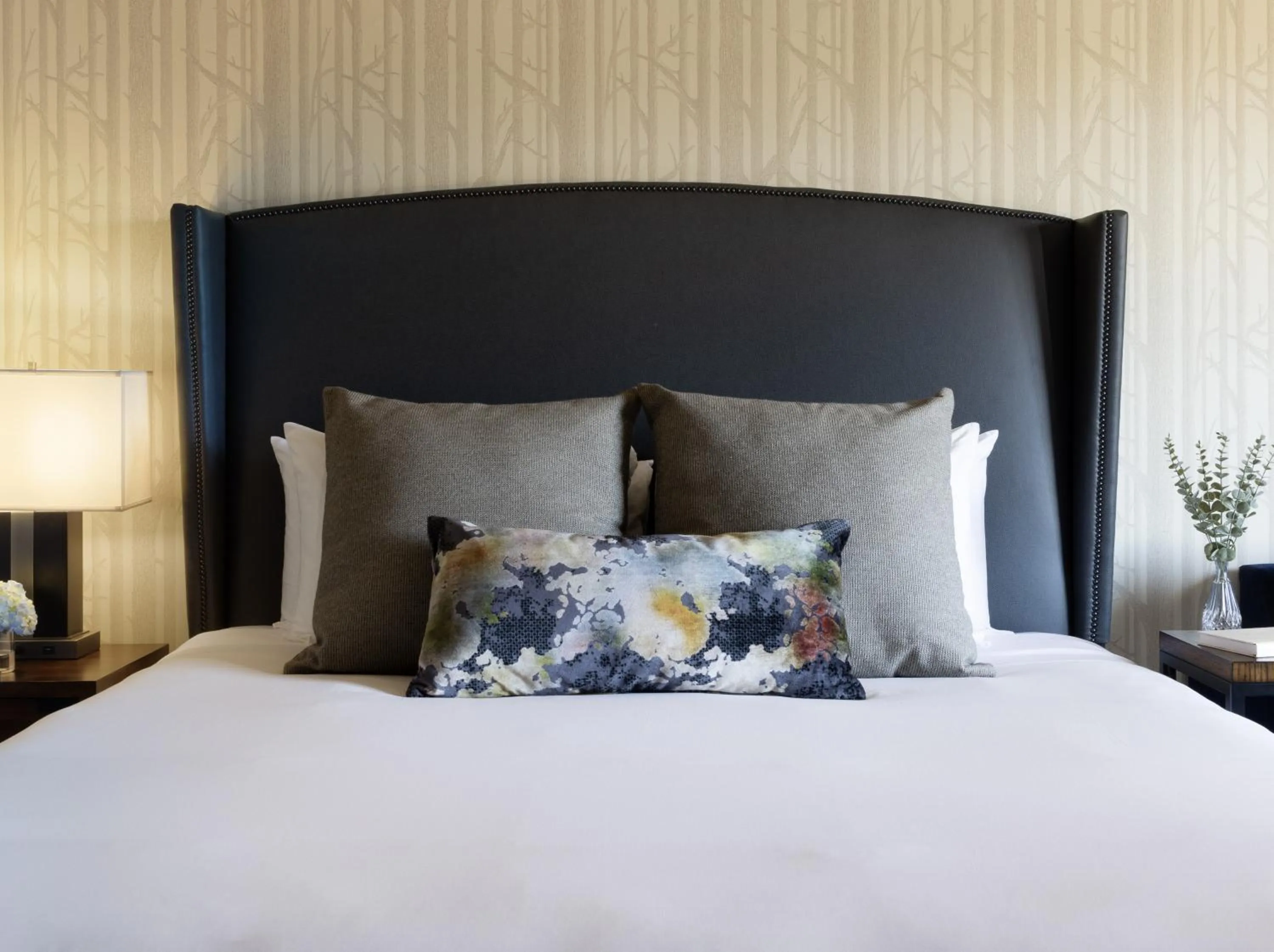 Bed in River Terrace Inn, a Noble House Hotel