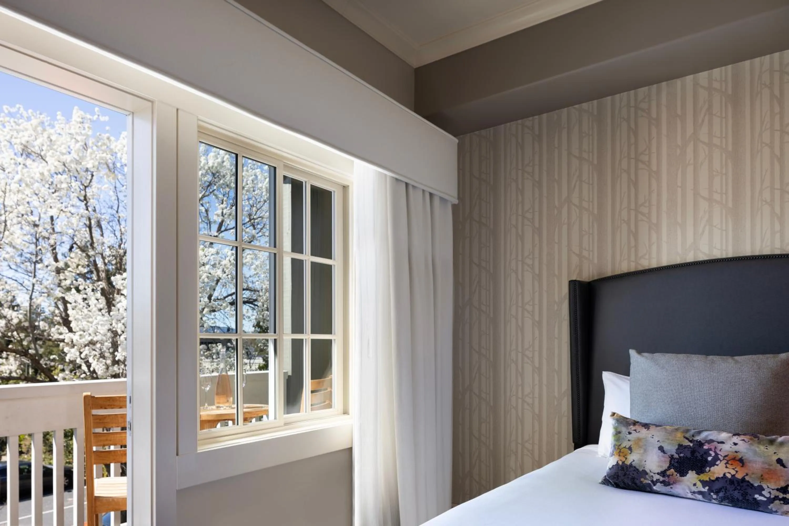 Bed in River Terrace Inn, a Noble House Hotel