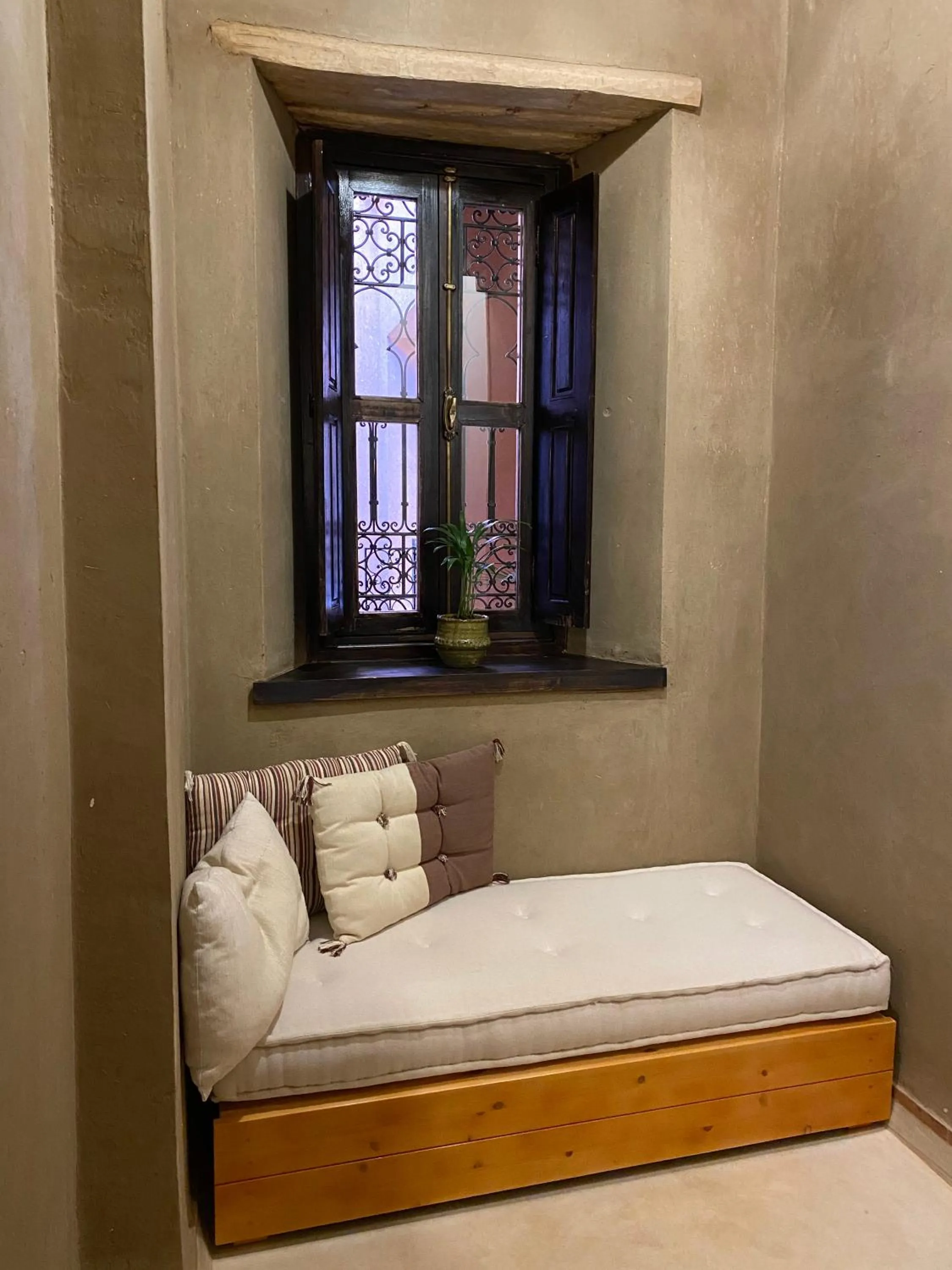 Seating area, Bed in Kasbah Tamsna