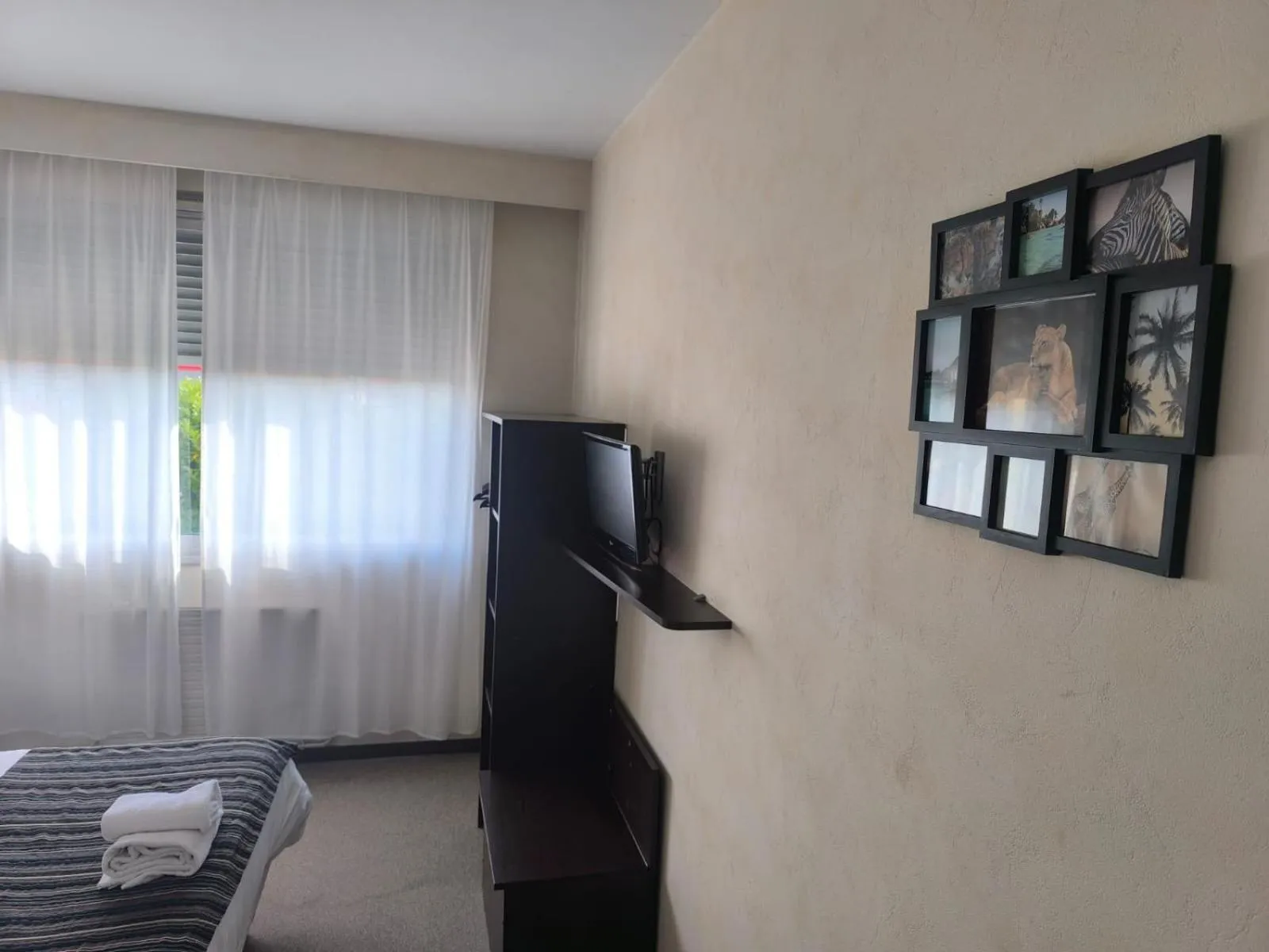 Photo of the whole room in Adonis Lyon Est Hôtel Artys