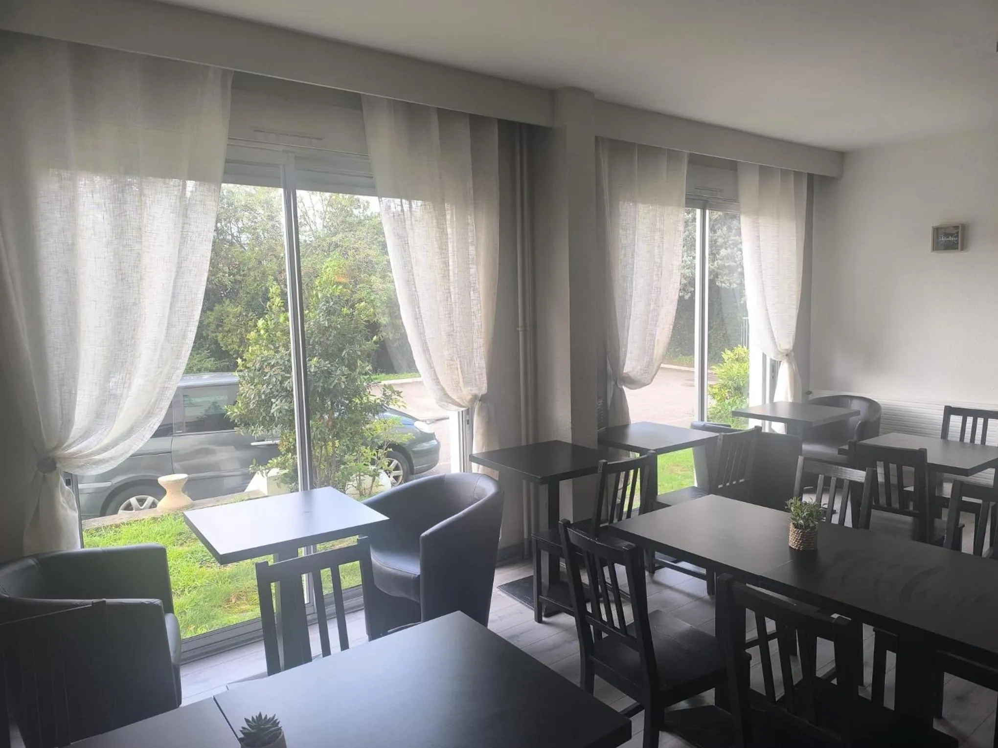 Buffet breakfast in Adonis Lyon Est Hôtel Artys