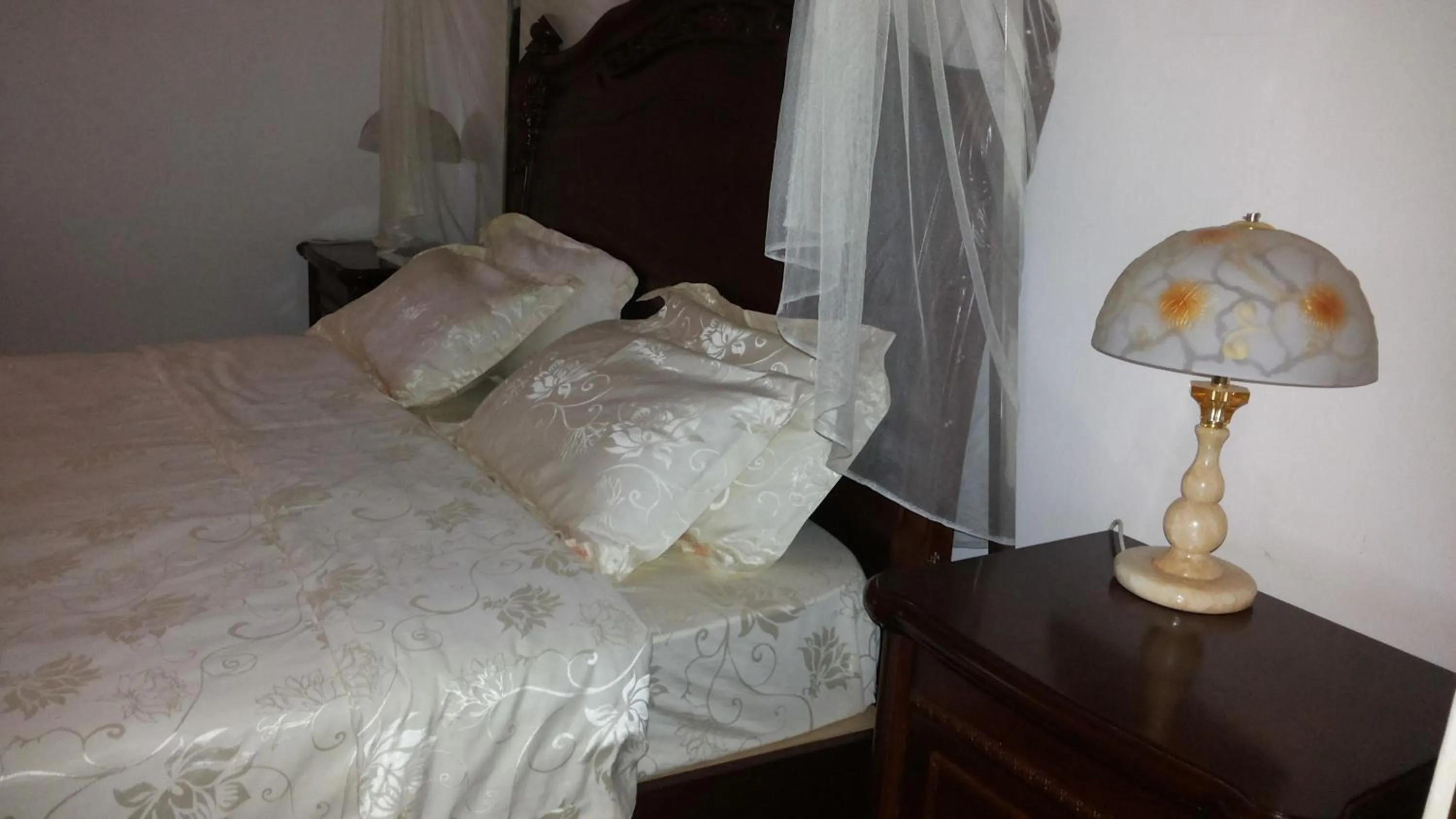 Bedroom in Zawadi Hotel