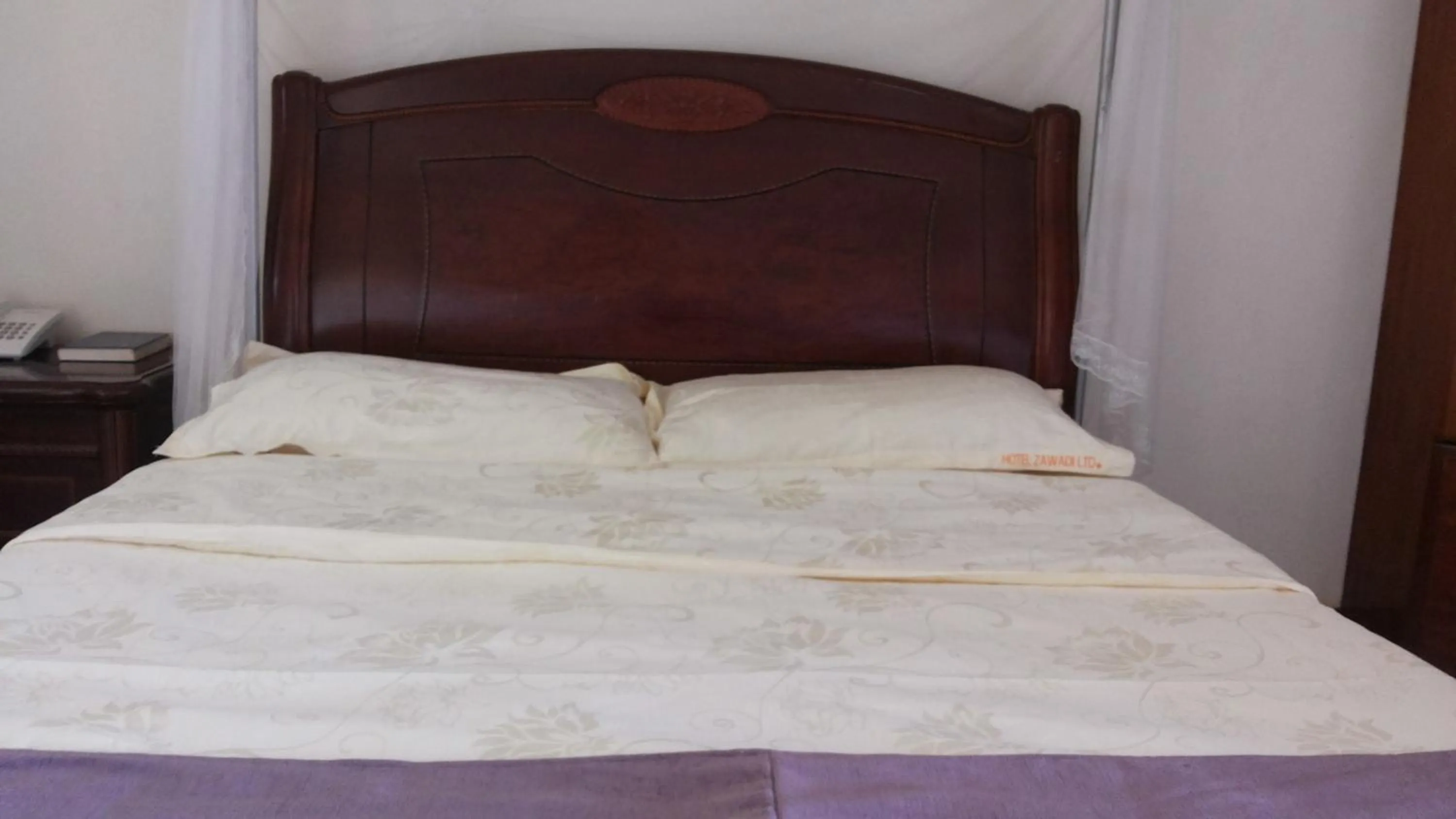 Bedroom in Zawadi Hotel