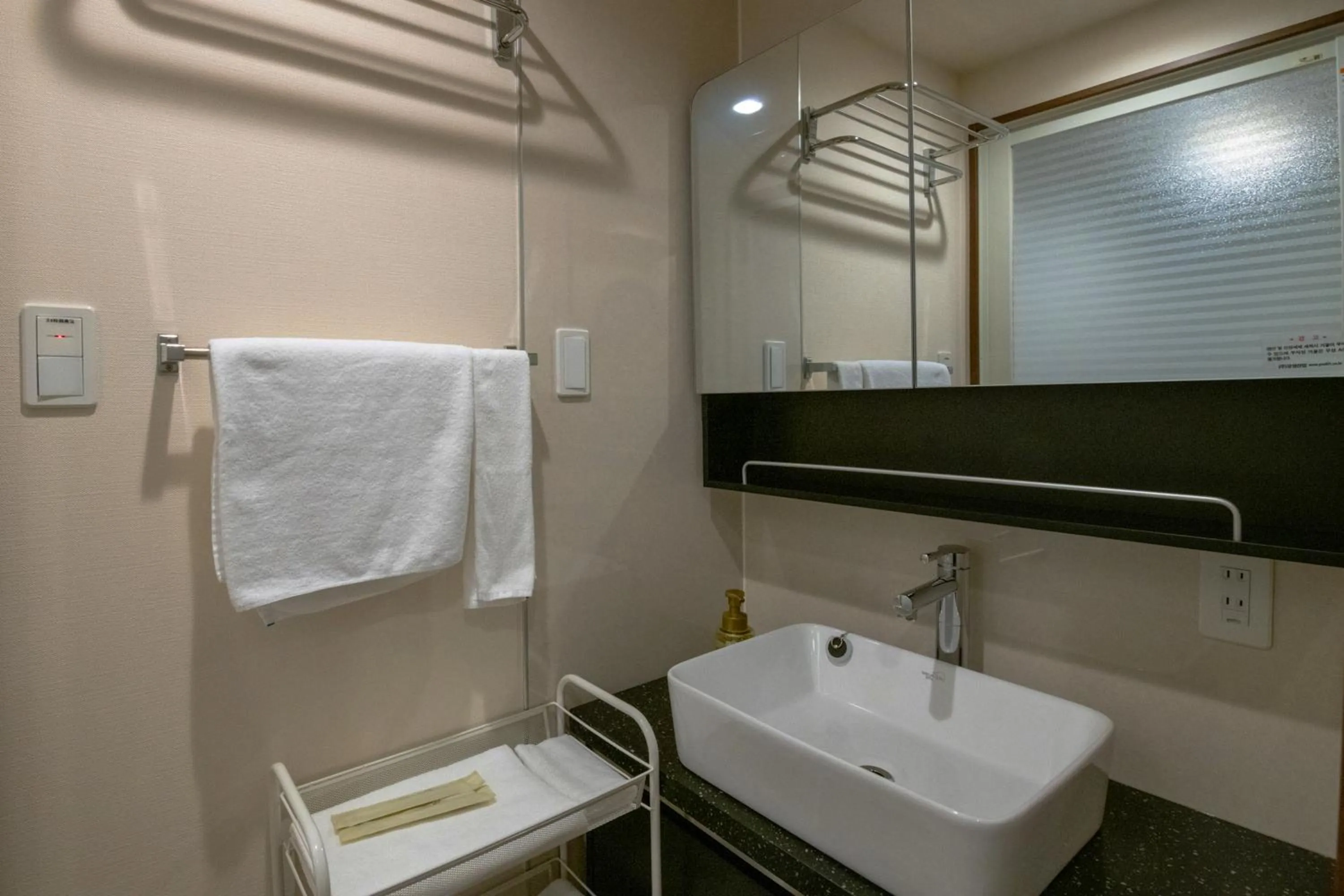 Bathroom in Aqua Resort in Chatan