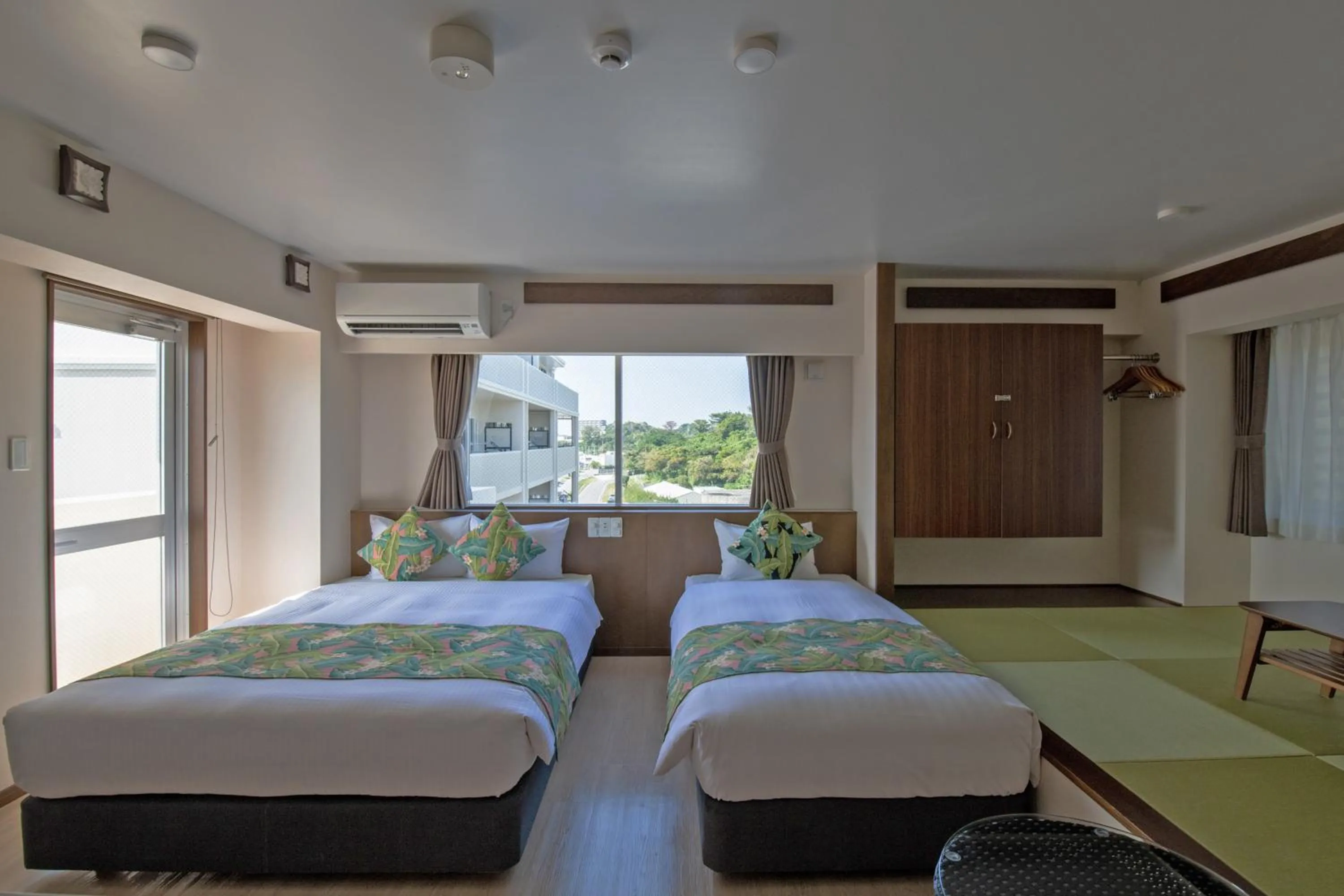 Photo of the whole room, Bed in Aqua Resort in Chatan