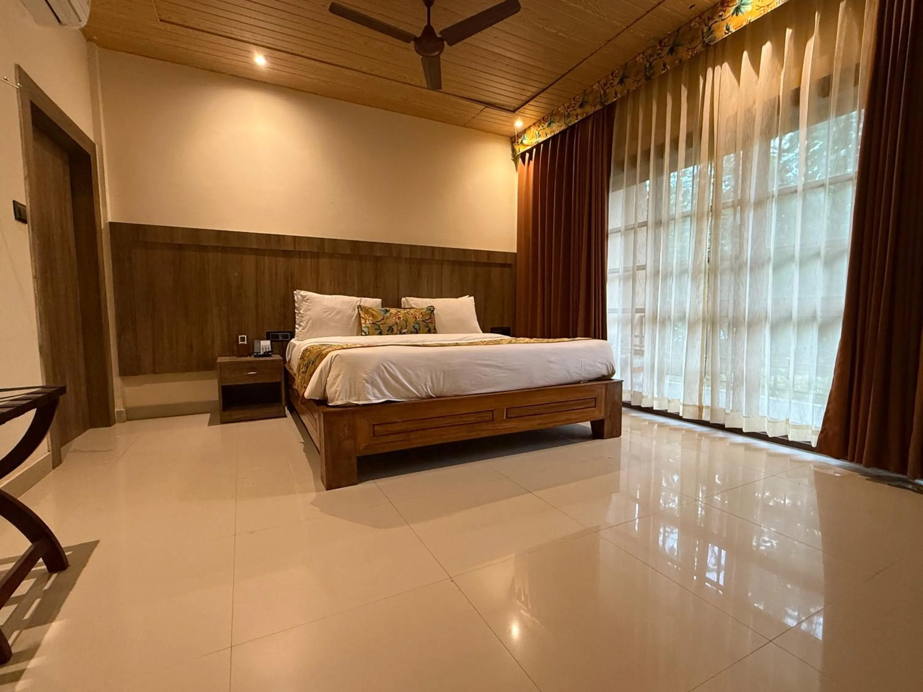 Bed in Kaziranga Eco Village Resort