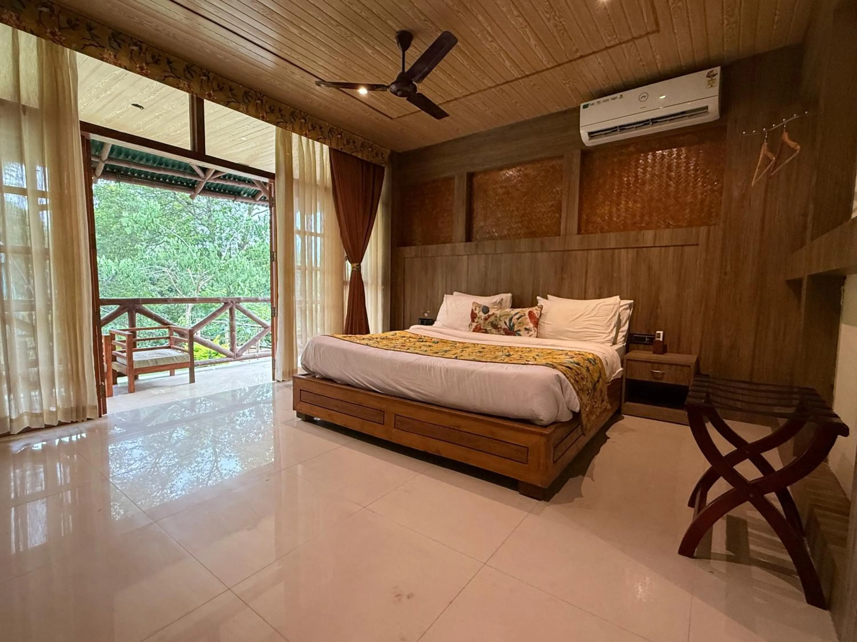 Bed in Kaziranga Eco Village Resort