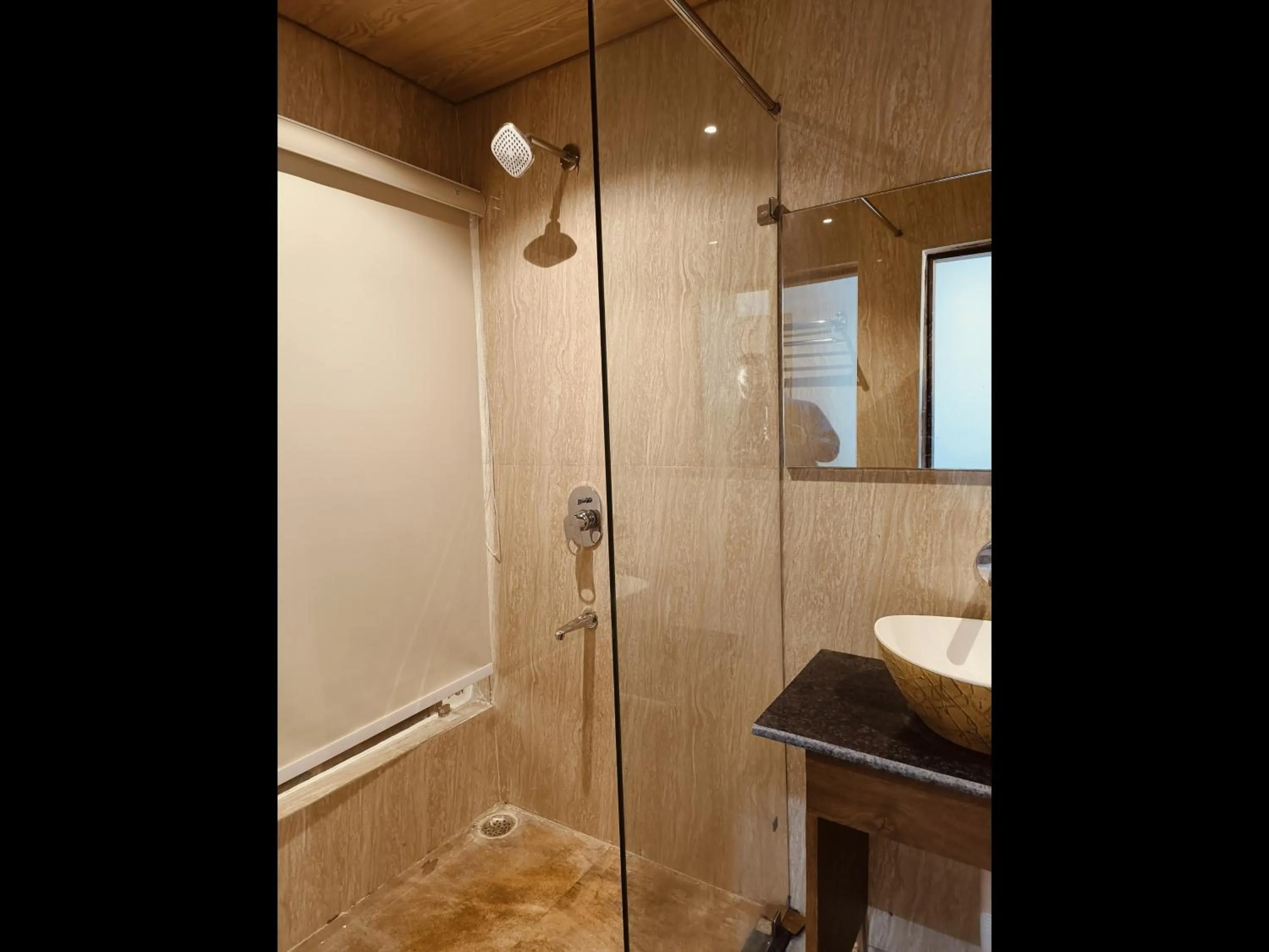 Shower in Kaziranga Eco Village Resort