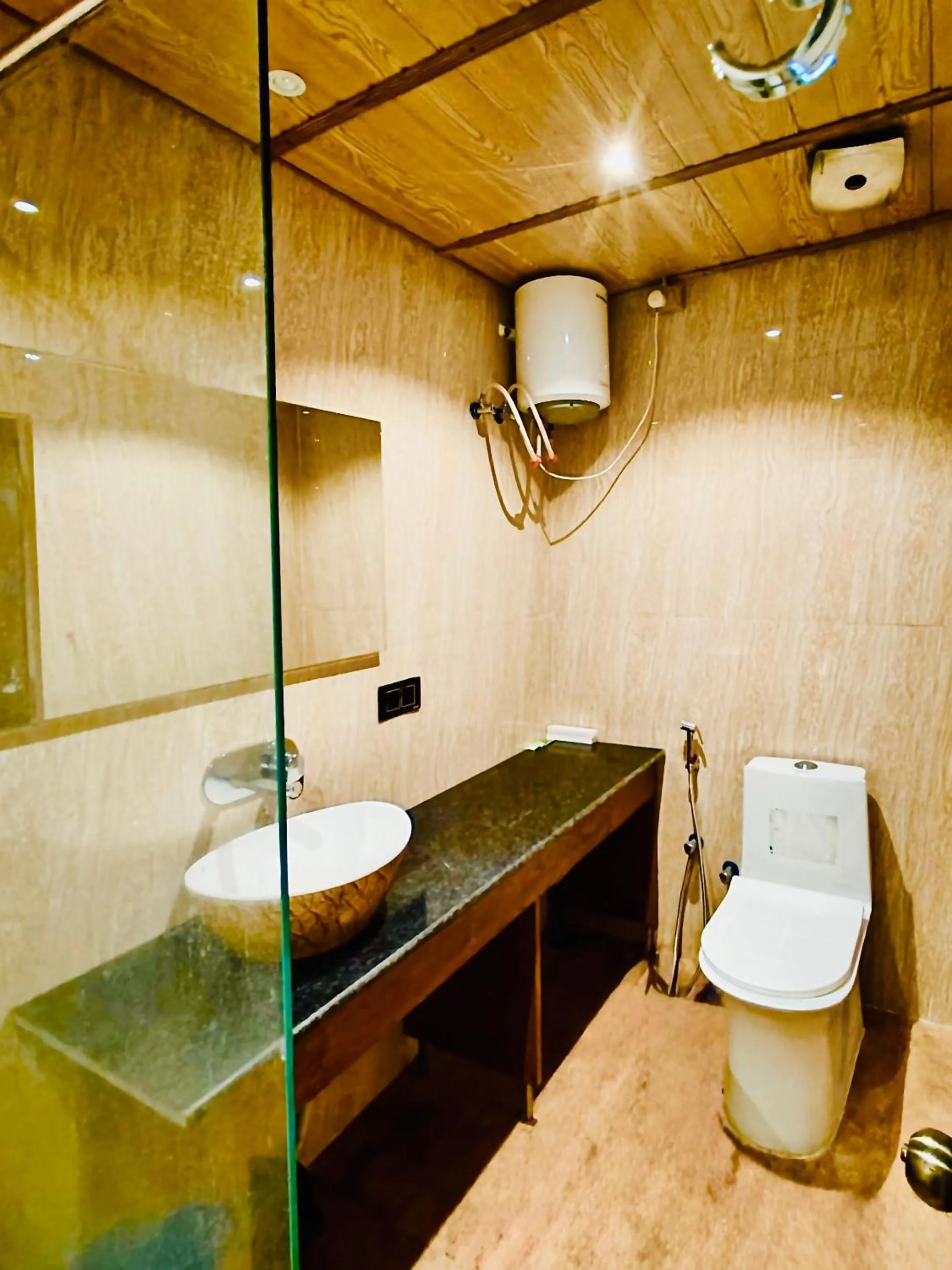 Shower in Kaziranga Eco Village Resort