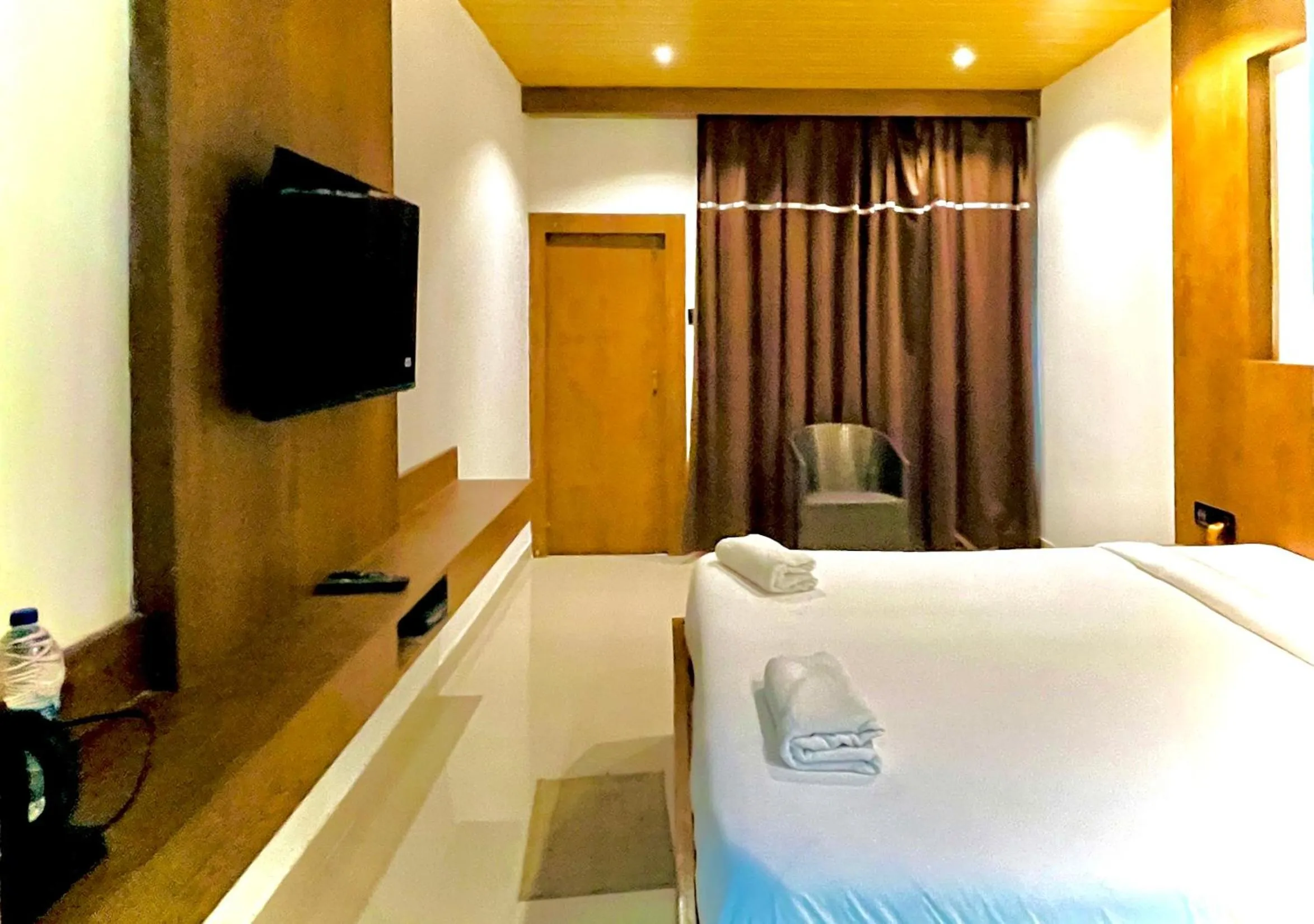 Bed in Kaziranga Eco Village Resort