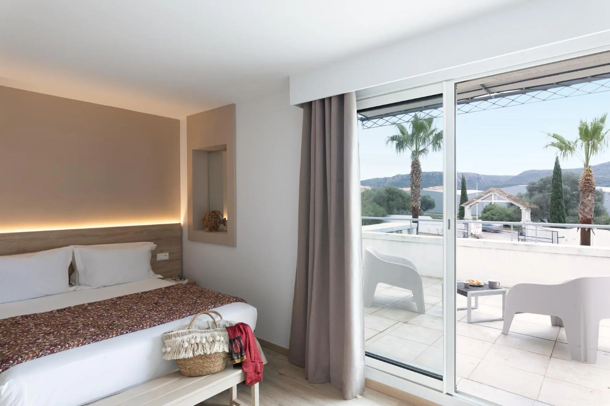 Balcony/Terrace, Bed in Golfe Hôtel & Spa Porto-Vecchio