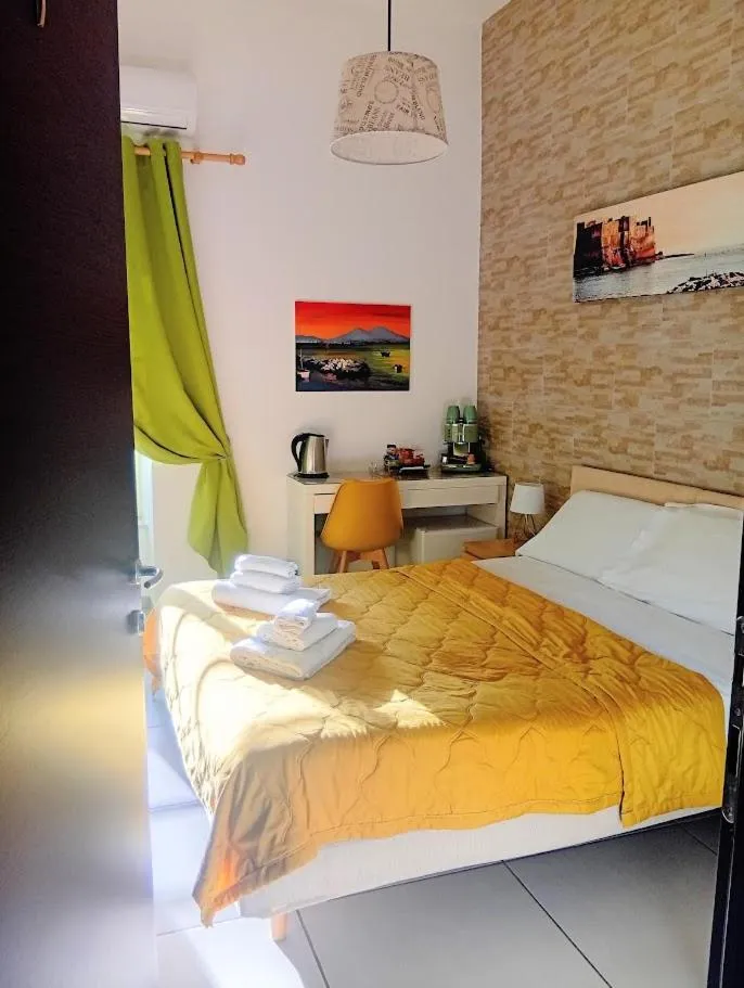 Bed in Megaride Santa Lucia