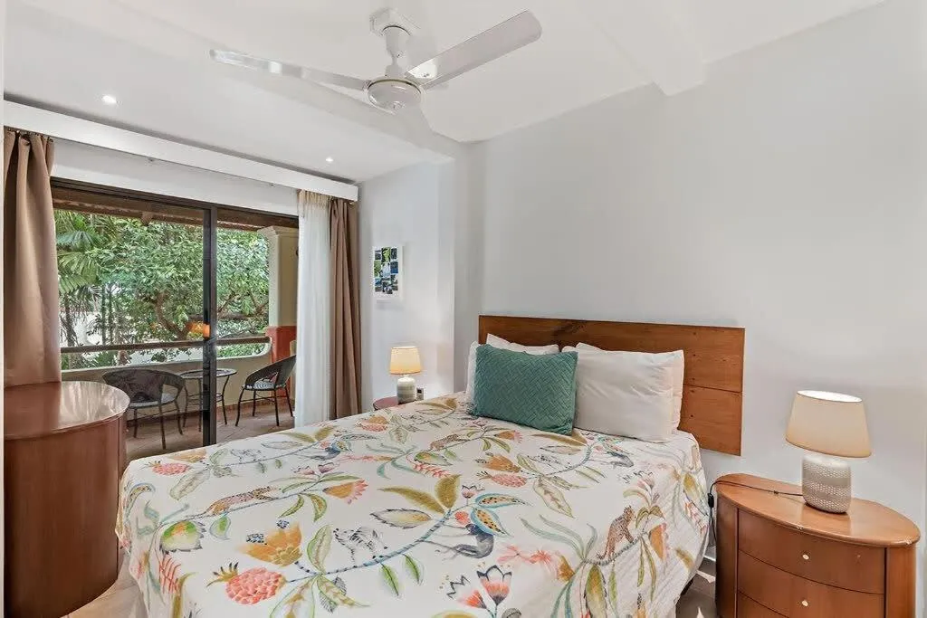 Bed in Colorful & Private 2-Bedroom Condo Just a Short Walk from the Beach