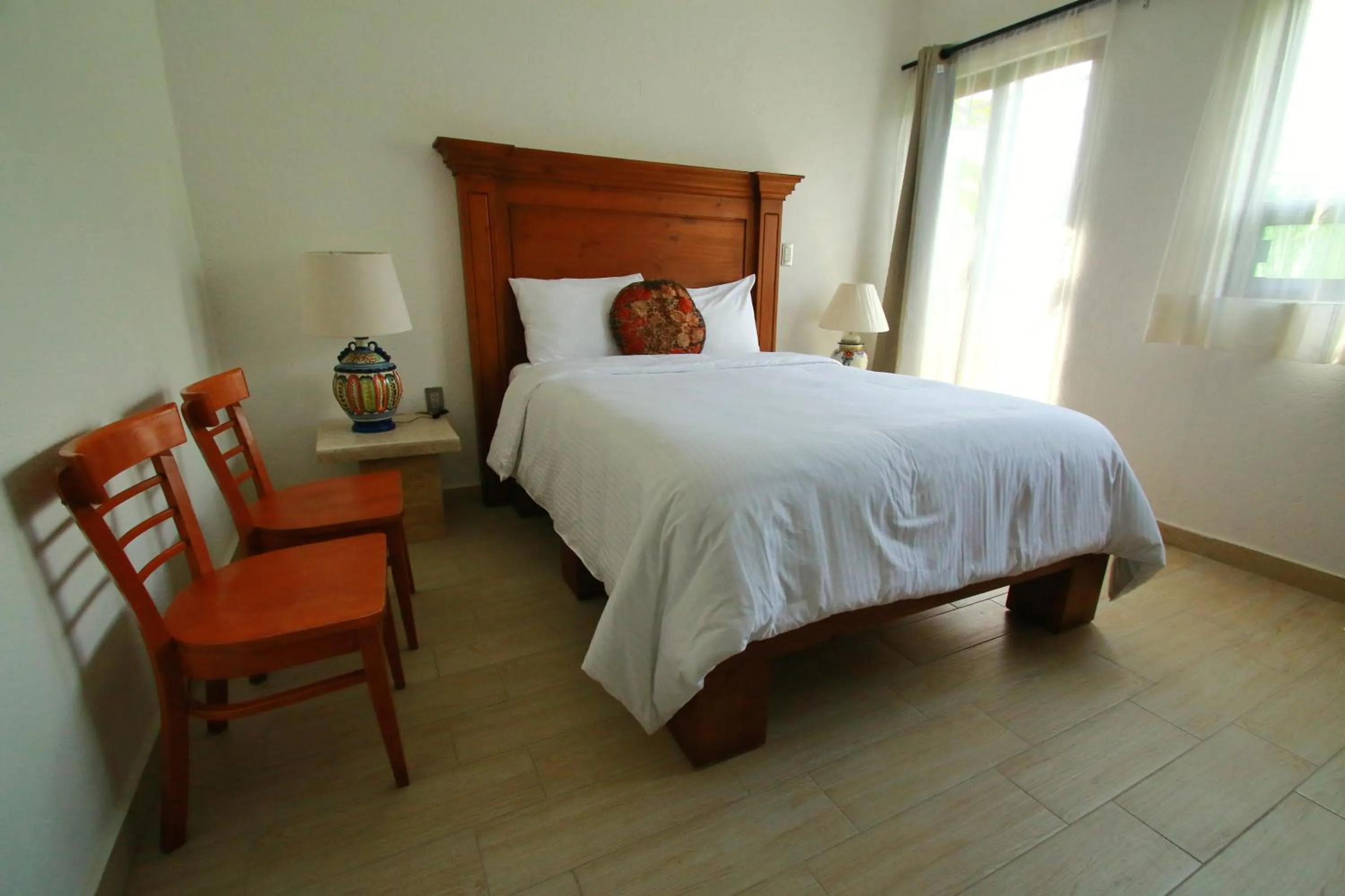 Bed in Hotel Concierge Flor y Canto