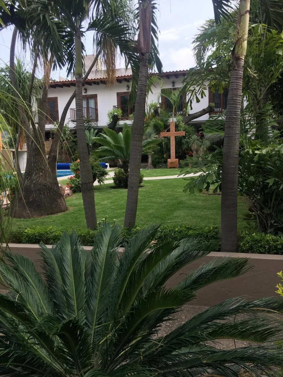 Property building in Hotel Concierge Flor y Canto