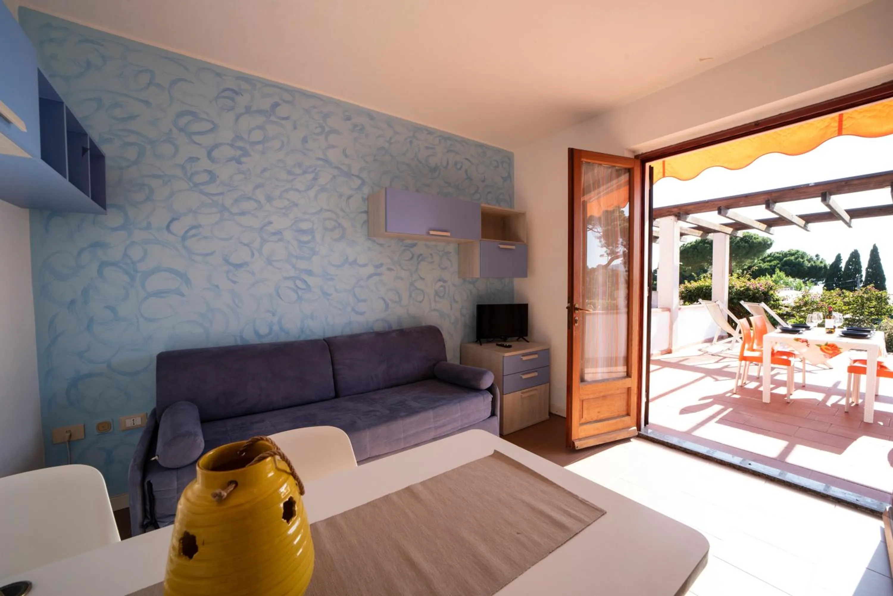 Living room, Bed in Residence Le Grazie Est