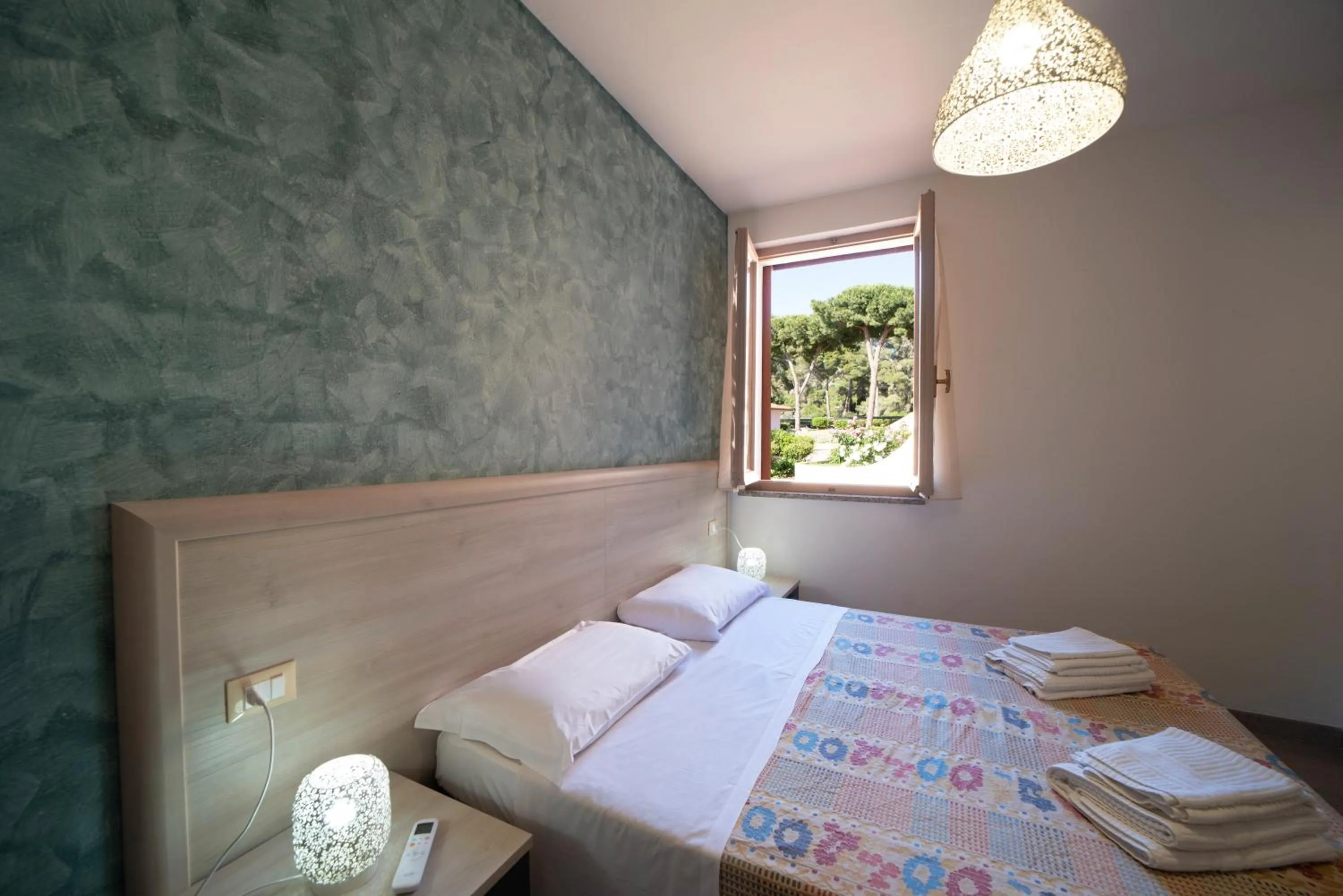 Photo of the whole room, Bed in Residence Le Grazie Est