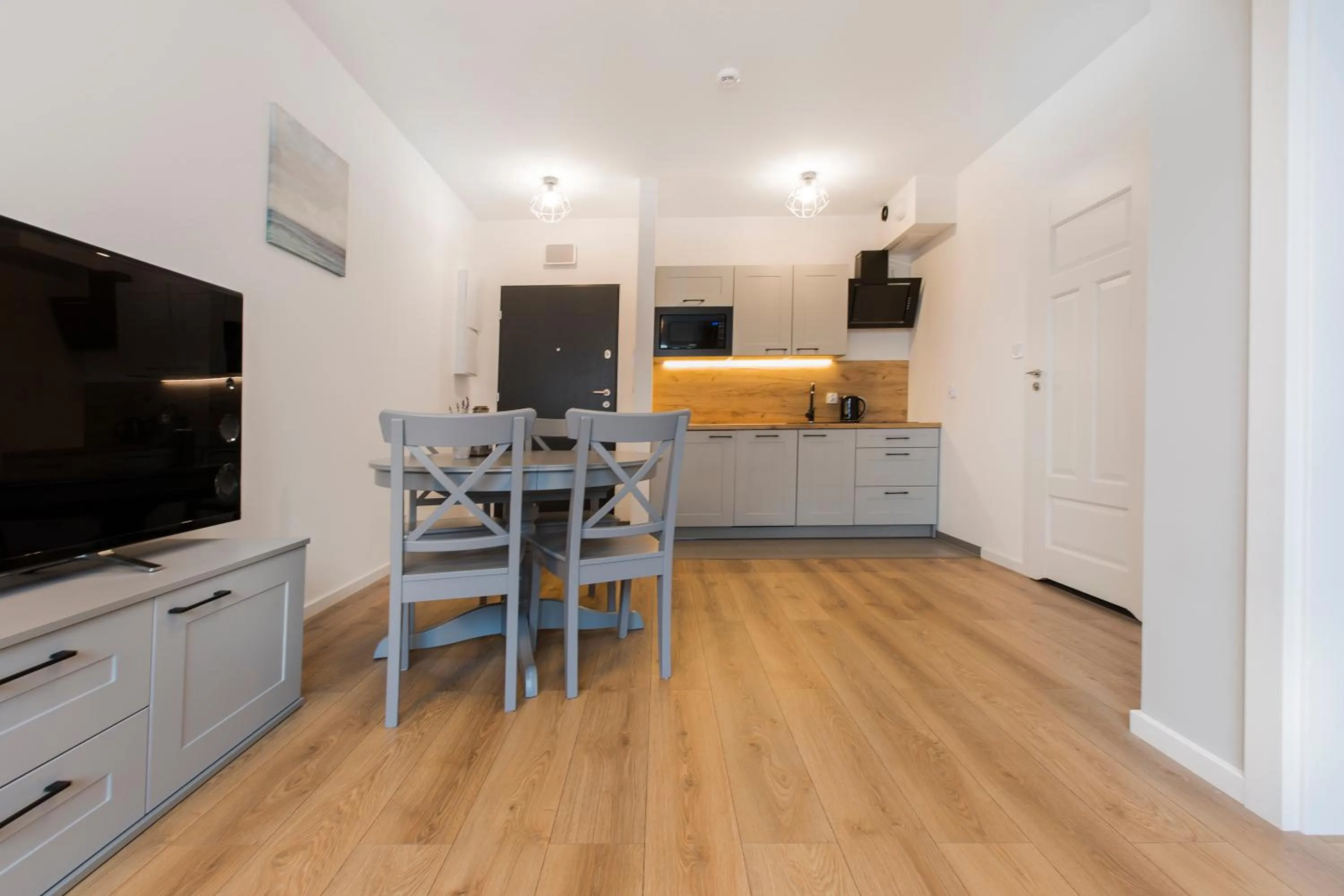 Kitchen or kitchenette in Symphony Baltica Towers Apartamenty