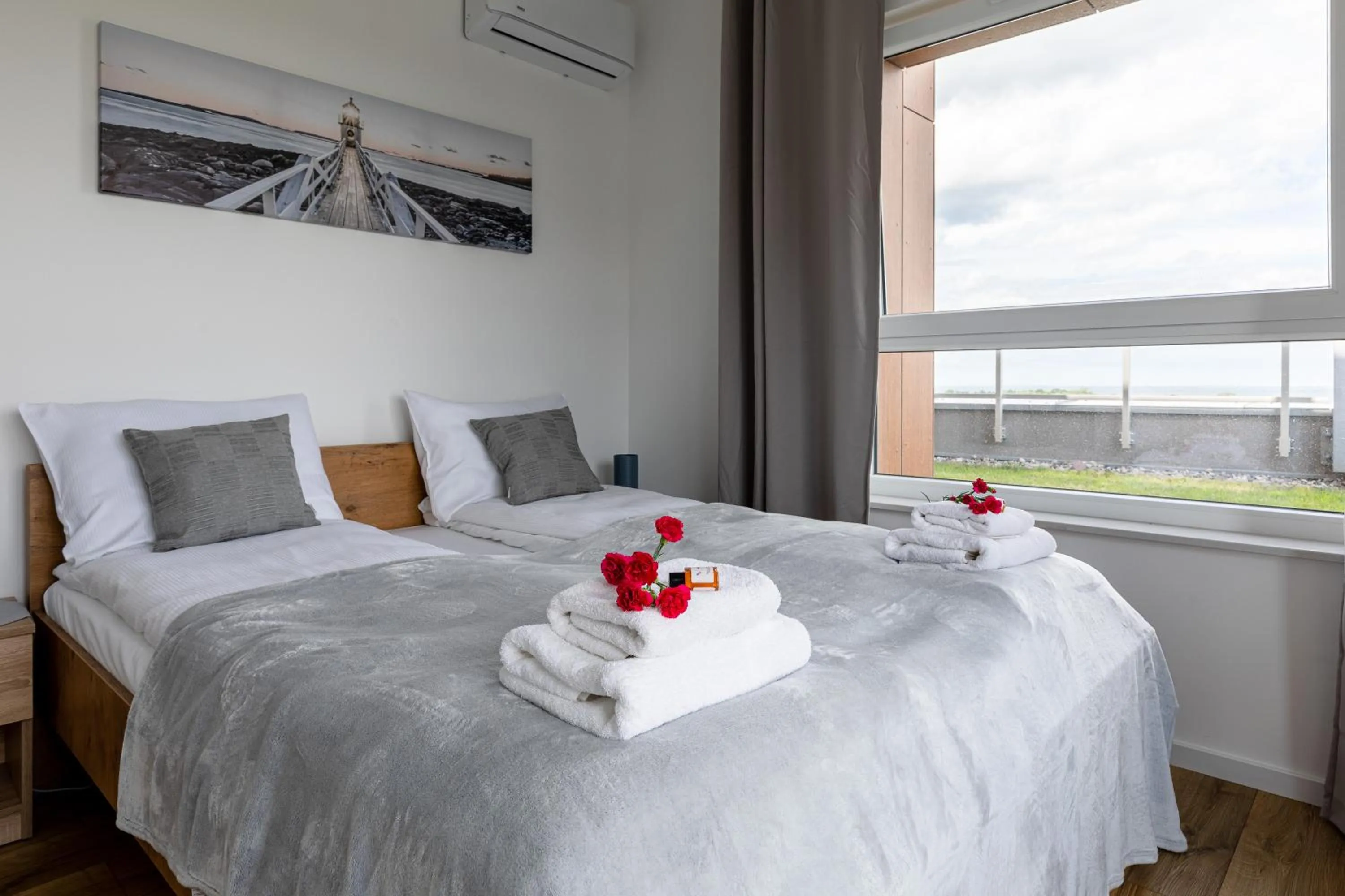 Bed in Symphony Baltica Towers Apartamenty