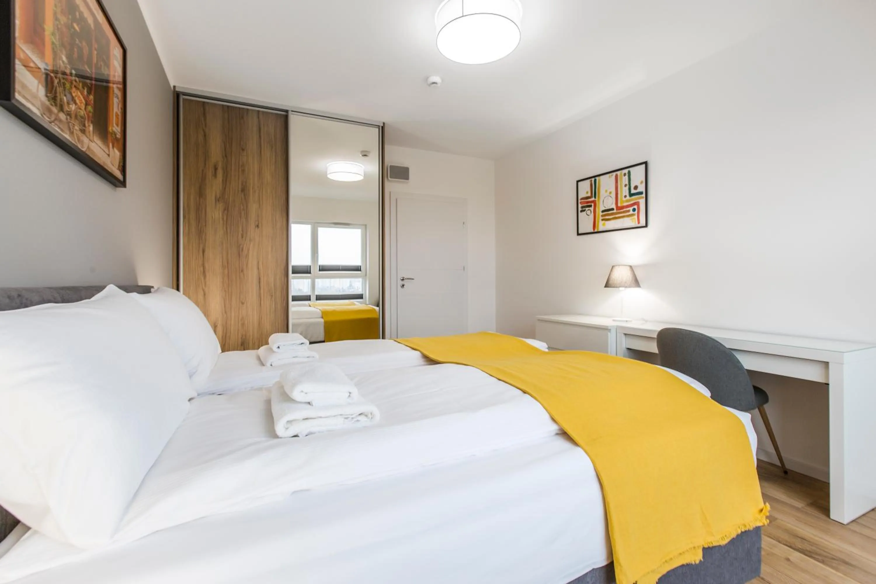 Bed in Symphony Baltica Towers Apartamenty