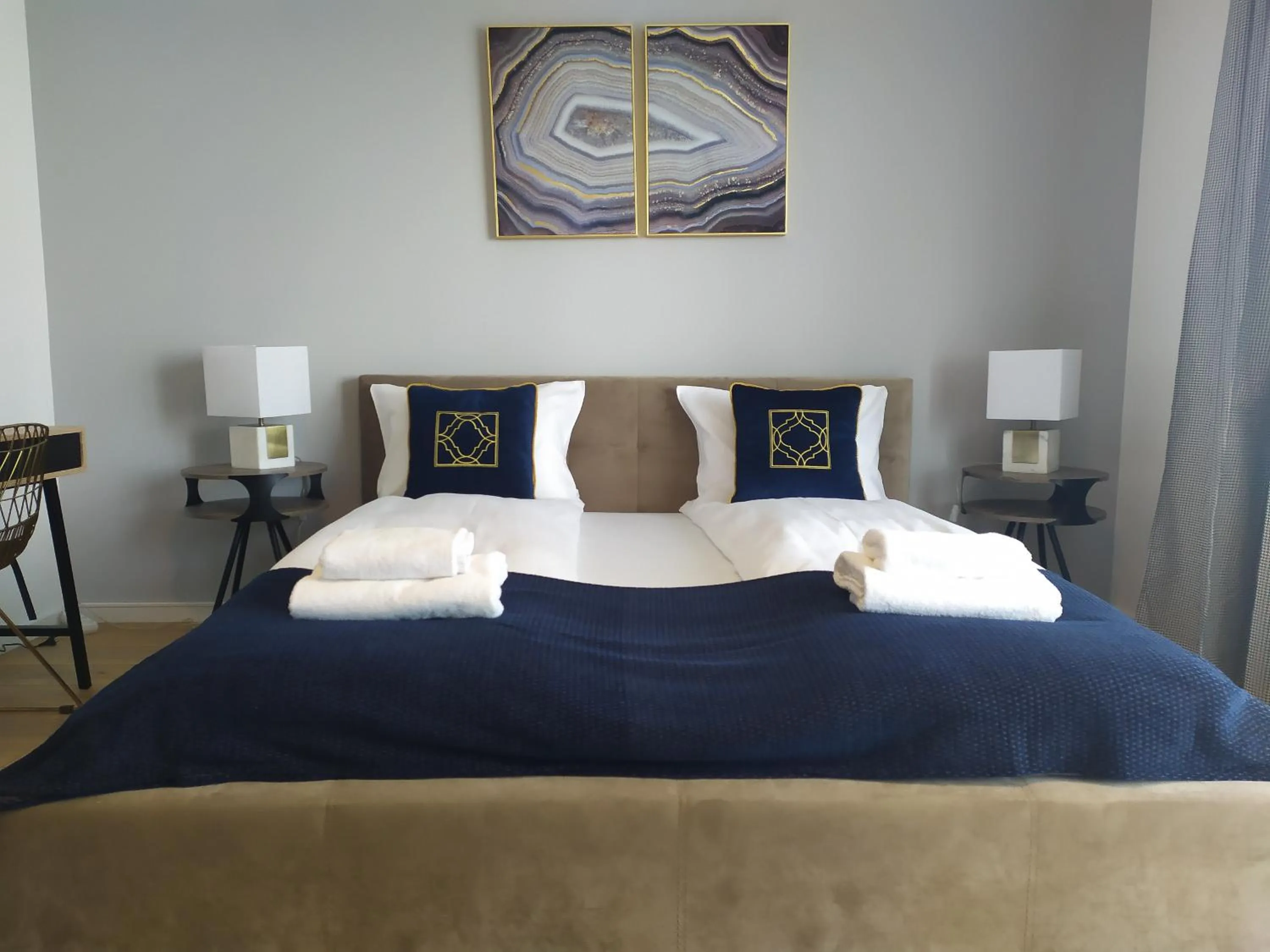 Bed in Symphony Baltica Towers Apartamenty