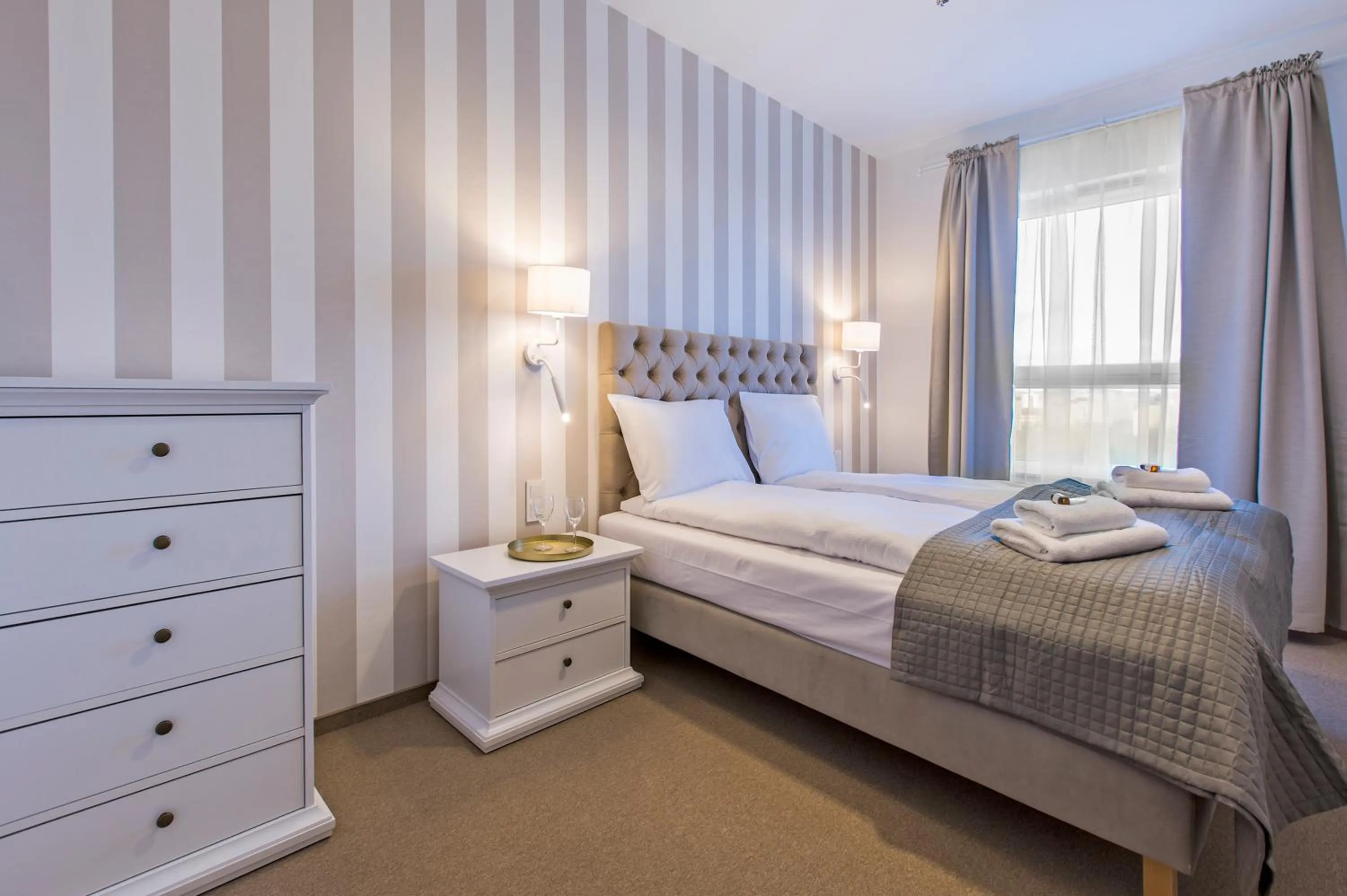 Bed in Symphony Baltica Towers Apartamenty