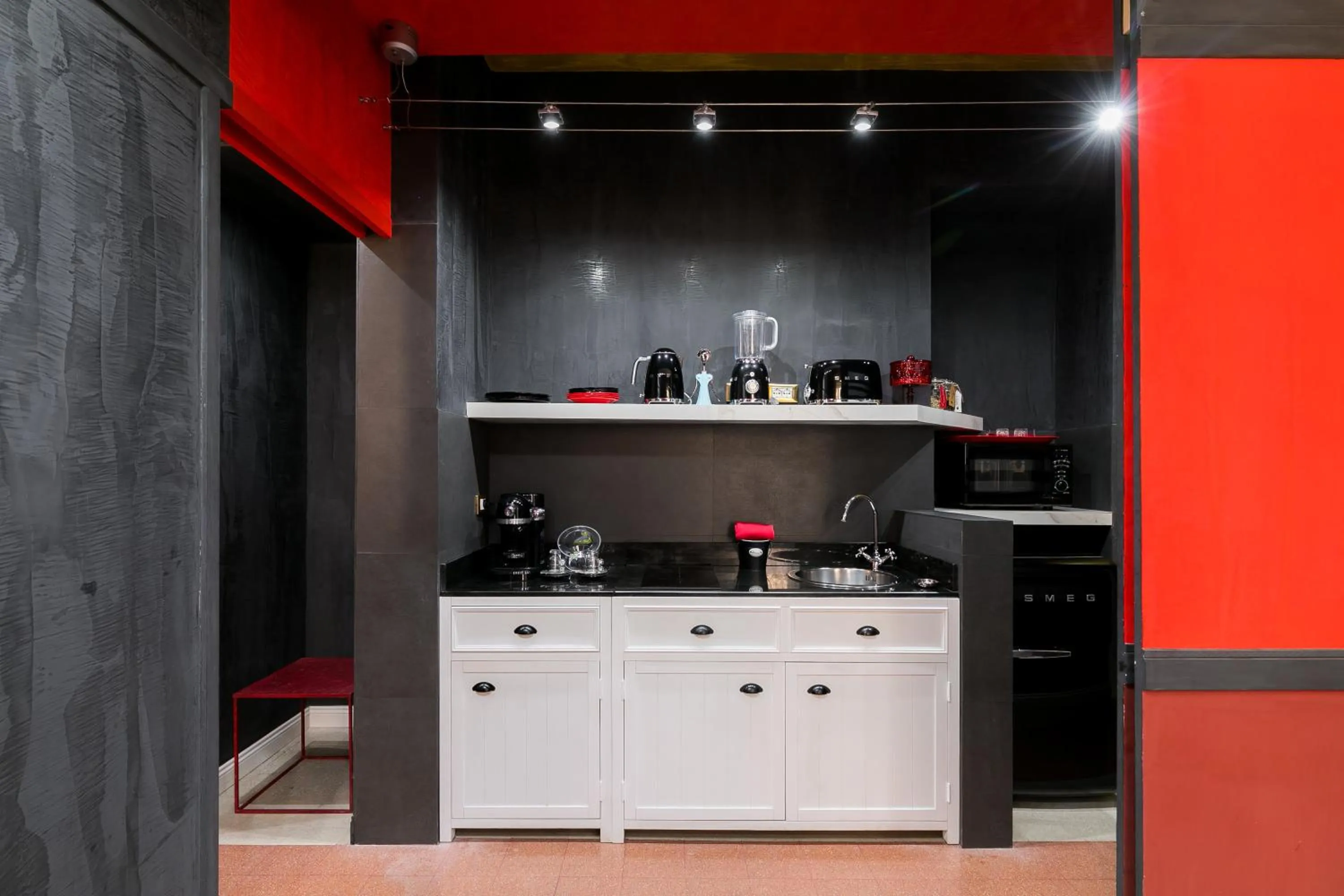 Kitchen or kitchenette in Appartamenti MarcoAurelio49