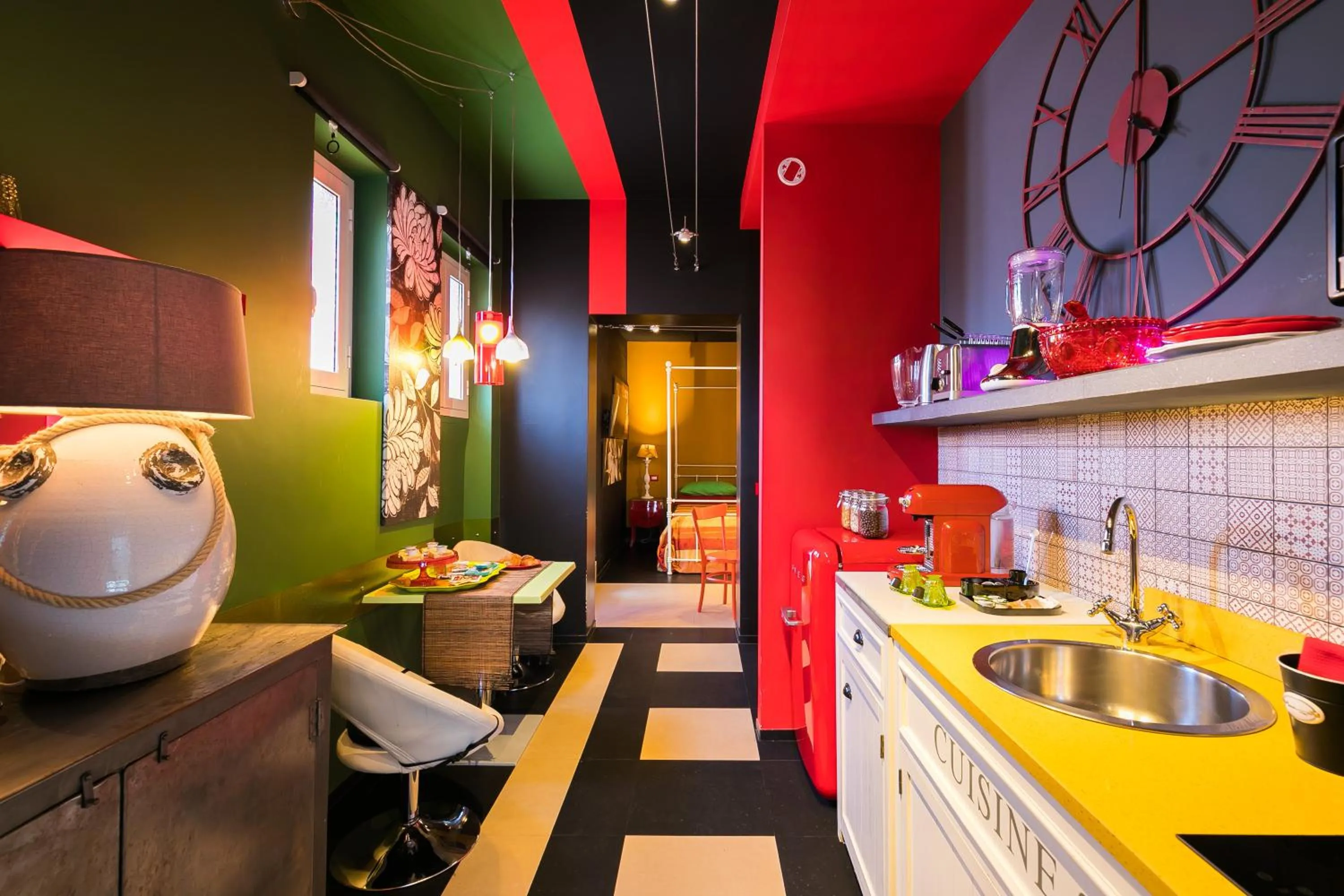 Kitchen or kitchenette in Appartamenti MarcoAurelio49