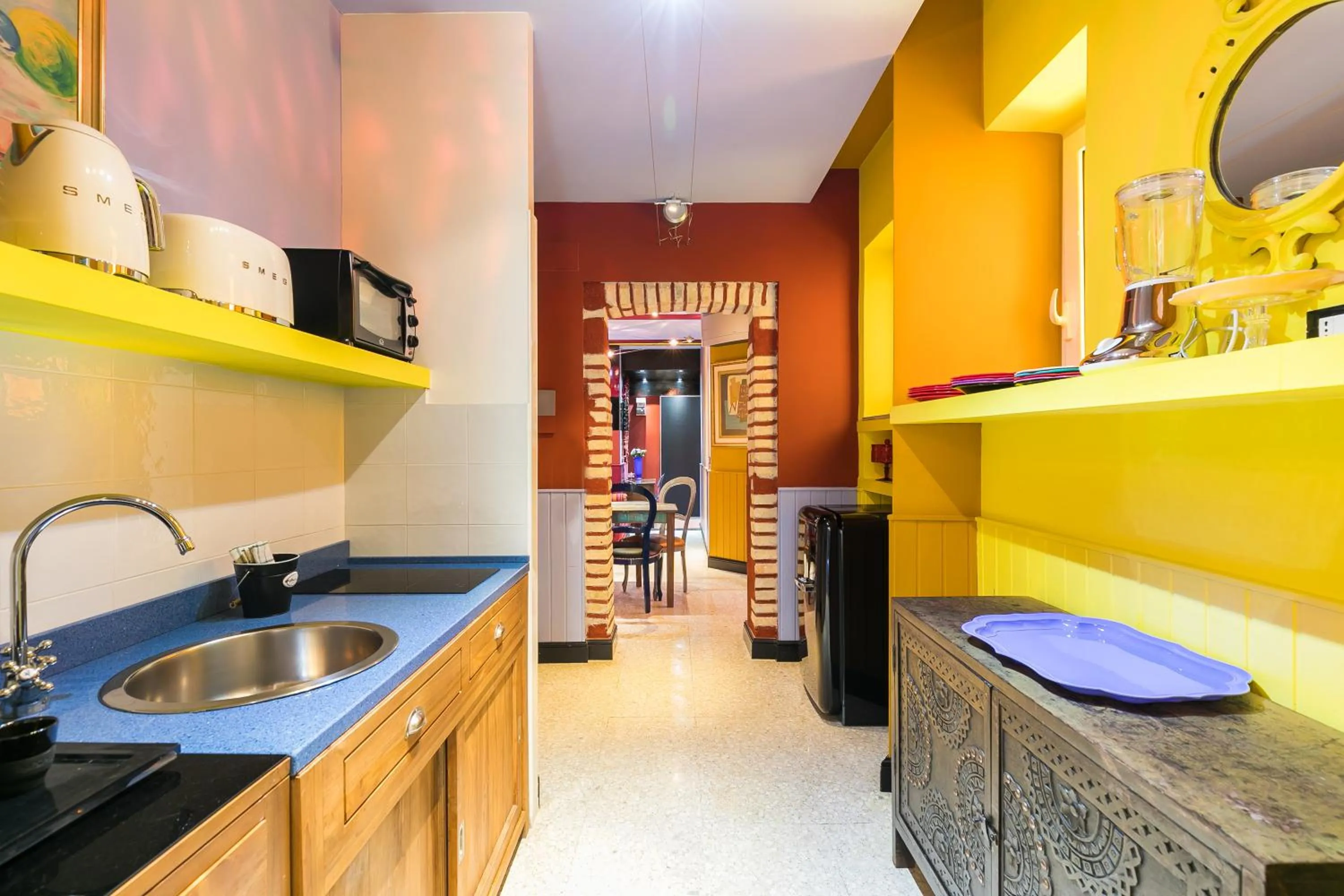 Kitchen or kitchenette in Appartamenti MarcoAurelio49