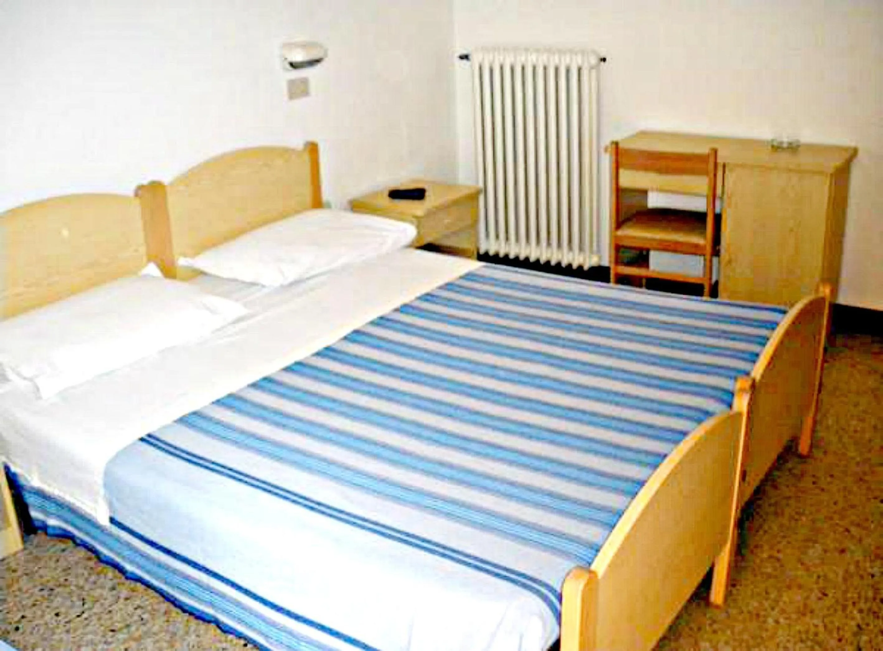 Bed in Hotel Ronconi