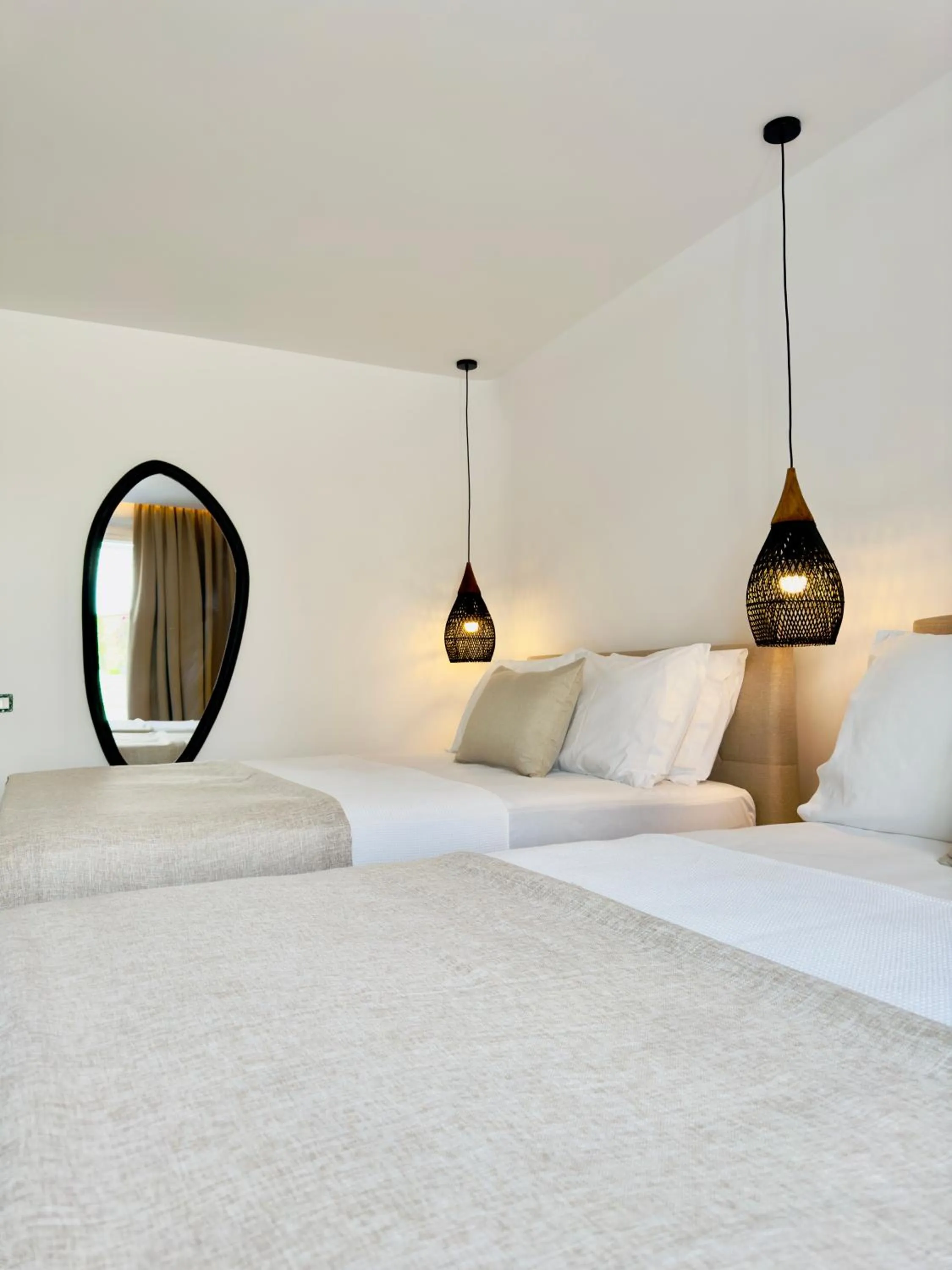 Bed in Sofos Suites Mykonos