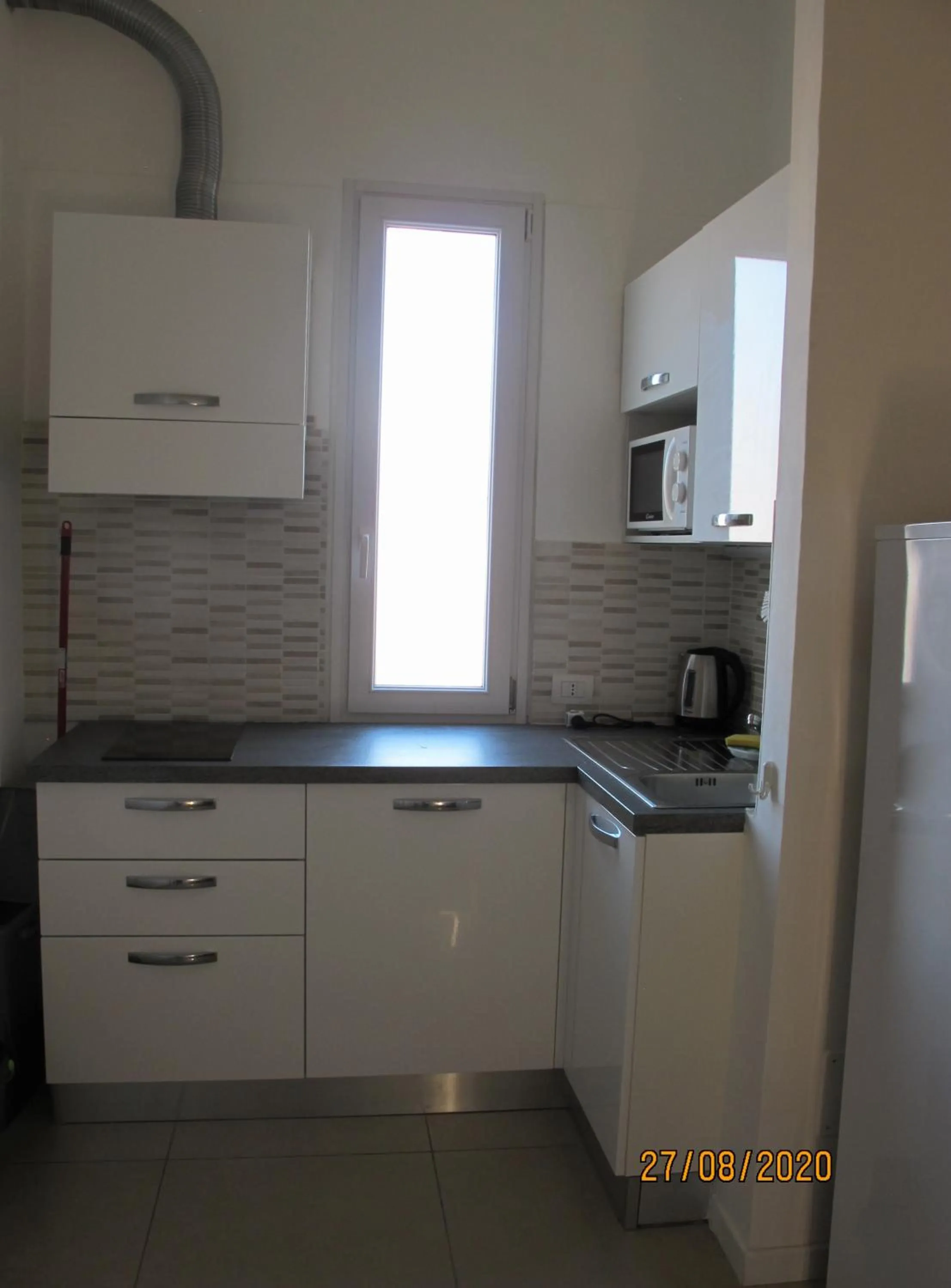 Kitchen or kitchenette in Santa Barbara hotel & apartments