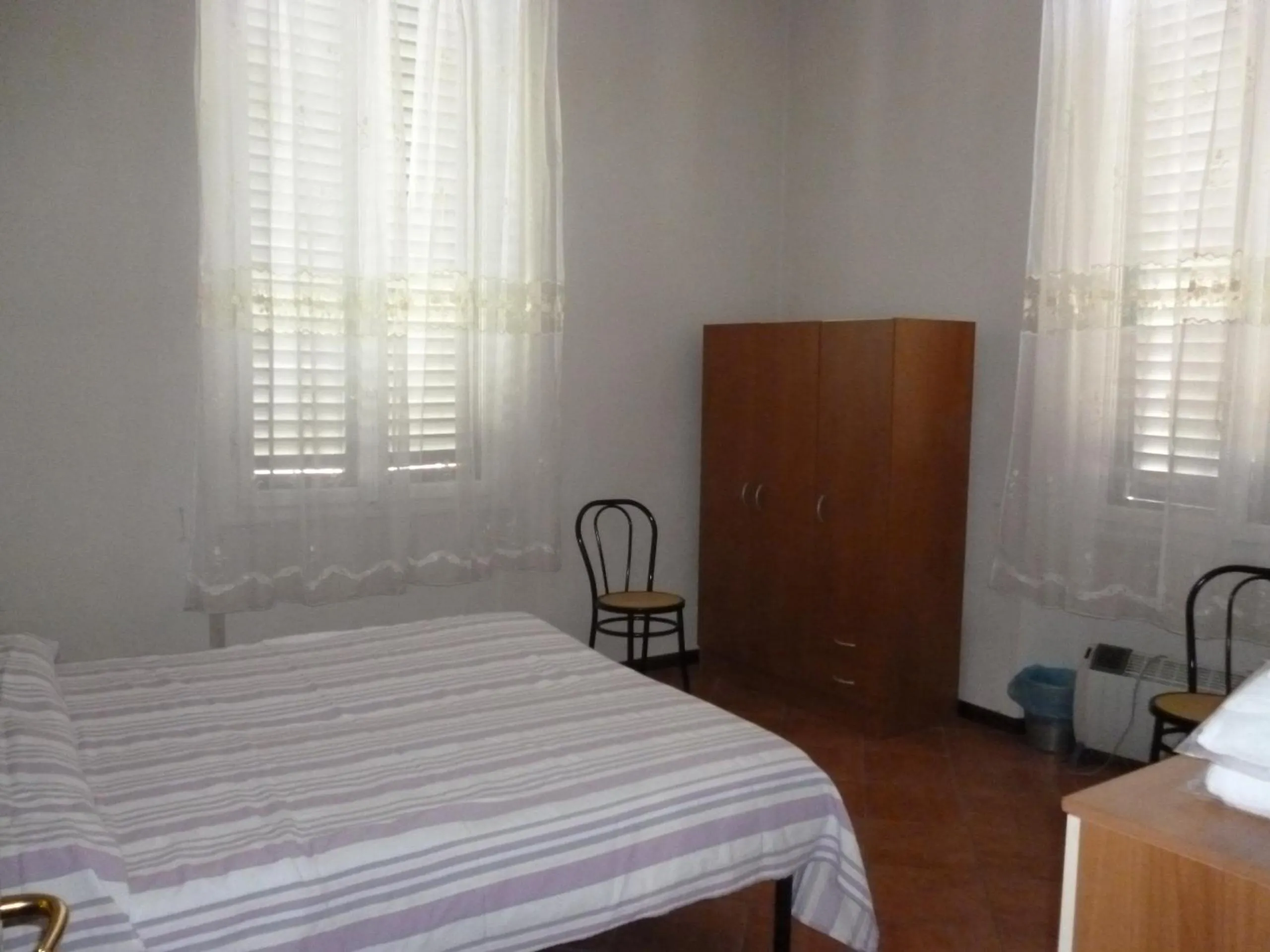 Photo of the whole room, Bed in 27 Aprile