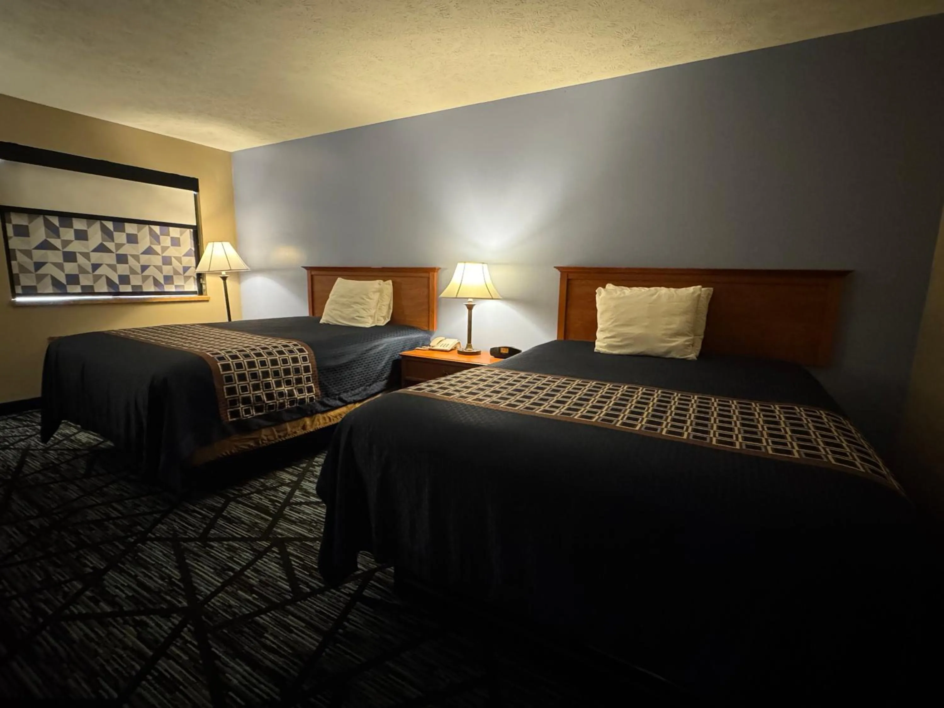 Bed in VICTORIAN INN