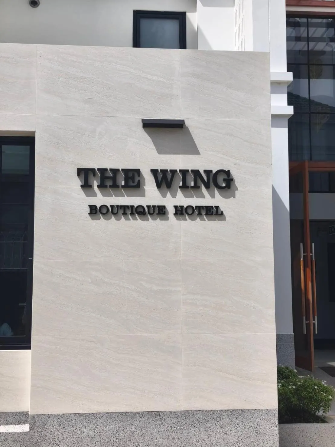 Property building in The Wing Boutique Hotel