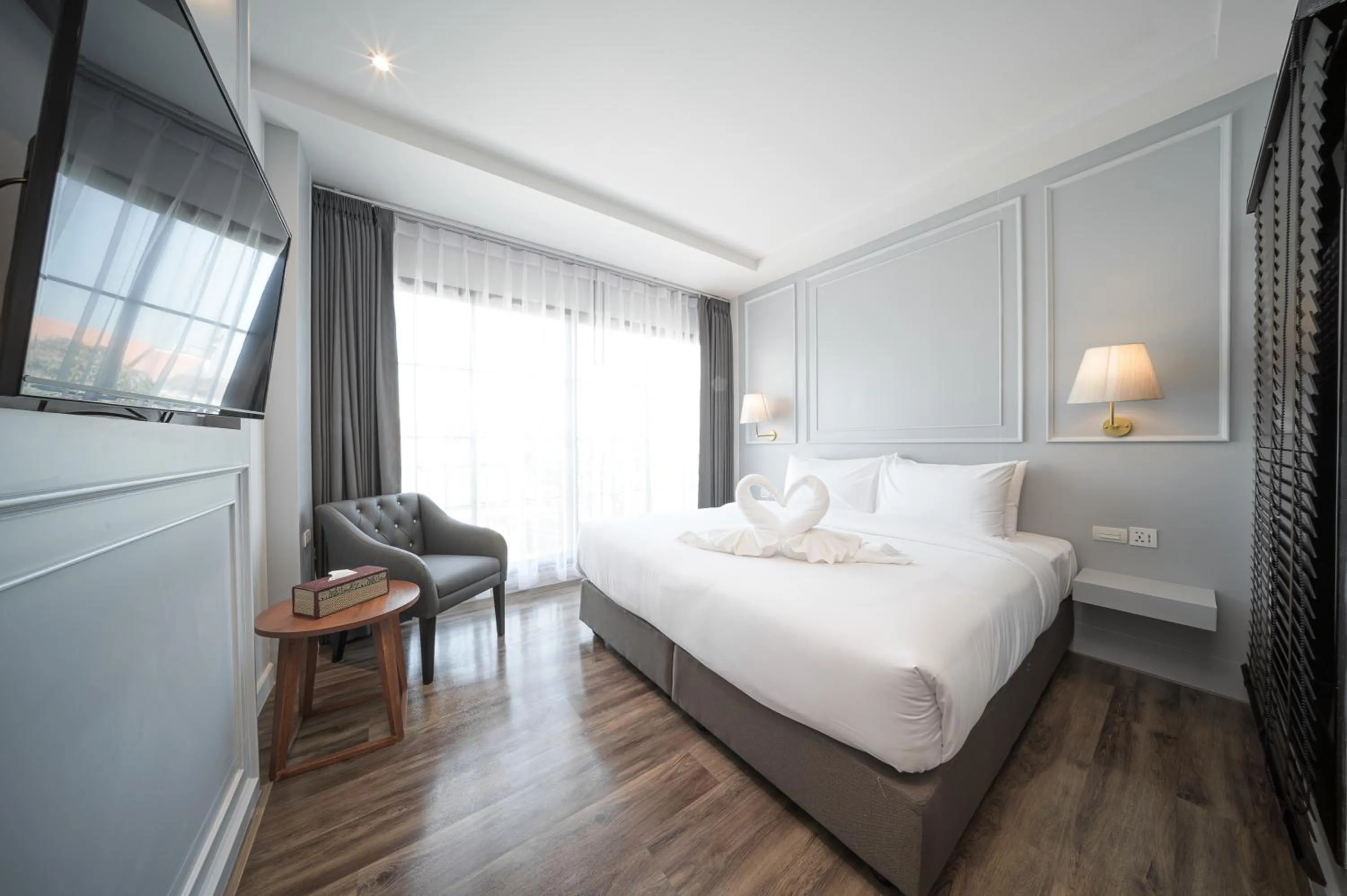 Photo of the whole room, Bed in The Wing Boutique Hotel