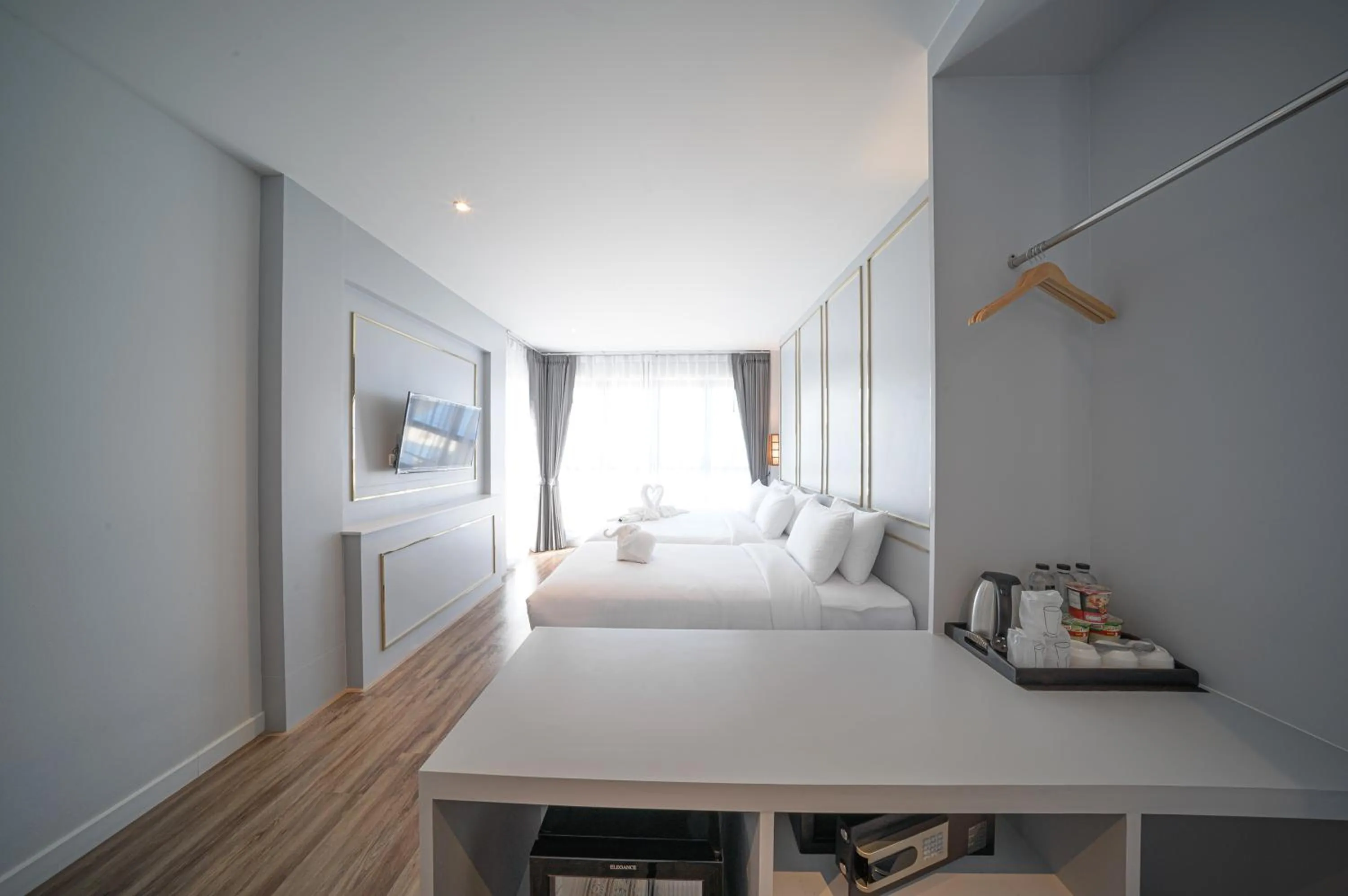 Photo of the whole room, Bed in The Wing Boutique Hotel