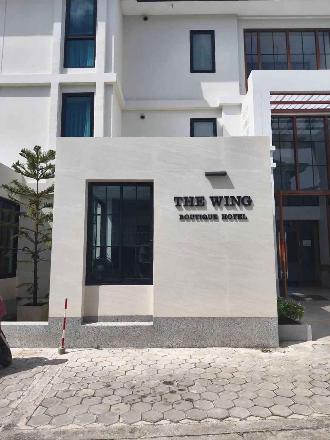 Property building in The Wing Boutique Hotel